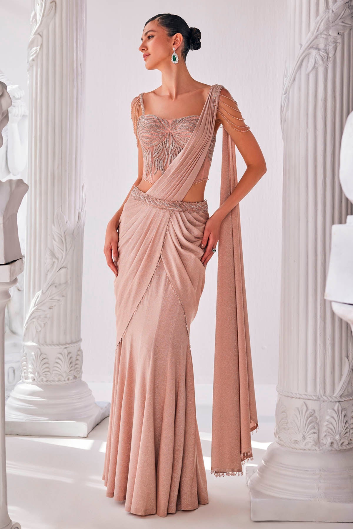 Buy Peach Draped Shimmering Saree by Mandira Wirk