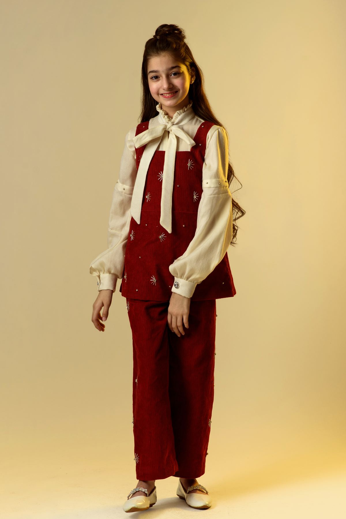 Buy Kids Designer Littleens Fusion set with organic corduroy trousers and overlayer paired with woollen matching shirt. A melange of pearl and stones embellishment with bow fastening and box pleated embroidered sleeves Online at ScrollnShops