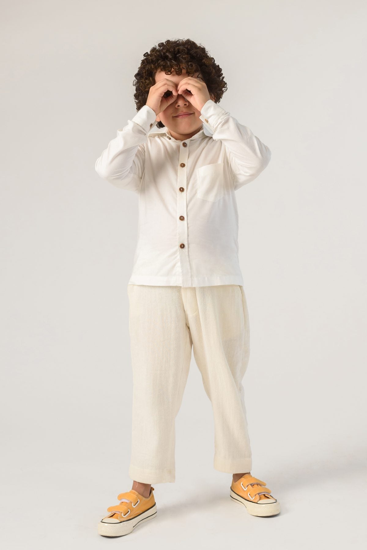 Buy Kids Designer Littleens Solid shirt with button down collar, full sleeves and bamboo buttons Online at ScrollnShops