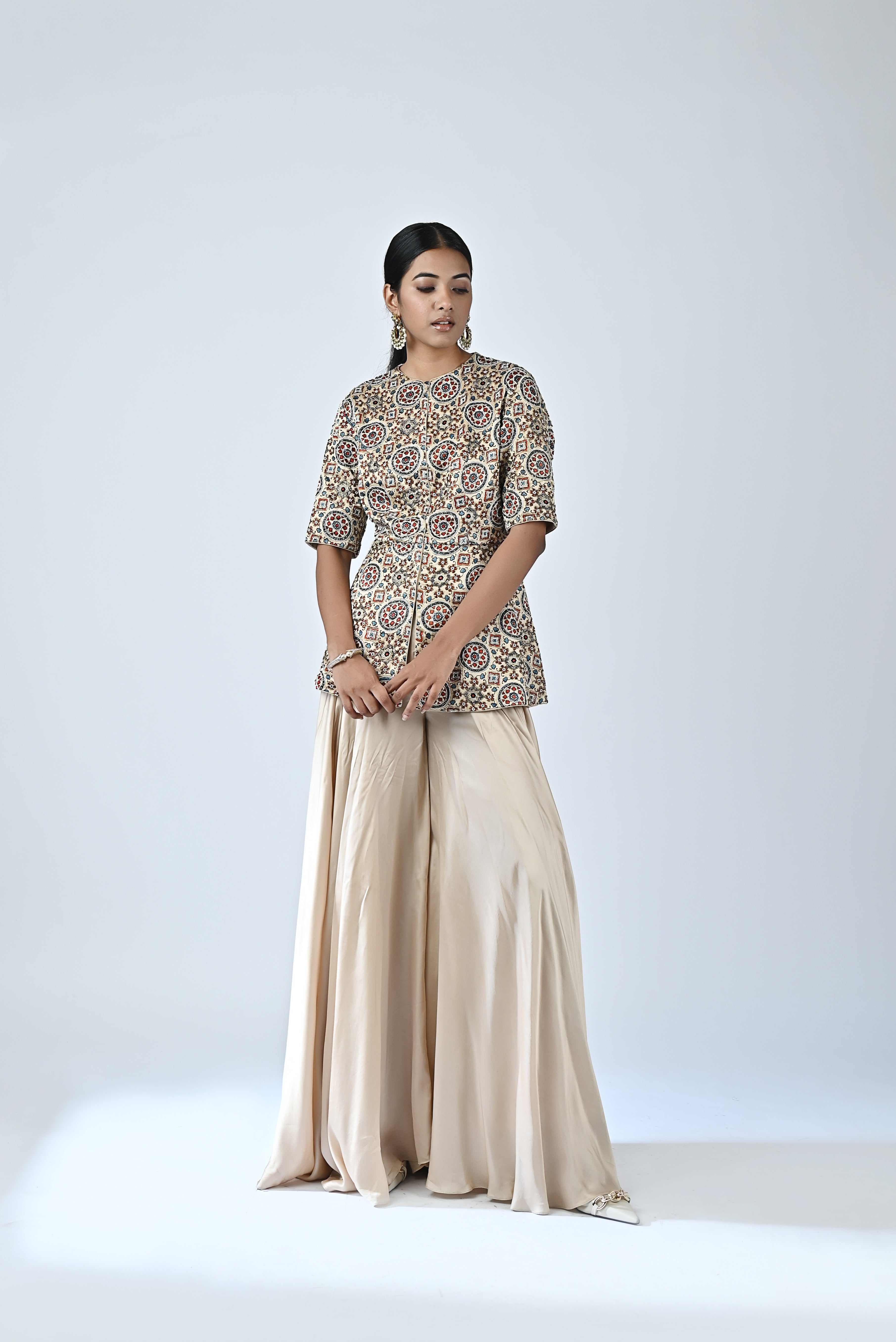 Buy Beige Ajrakh Peplum Top & Pants by Sejal Kamdar for women online at ScrollnShops