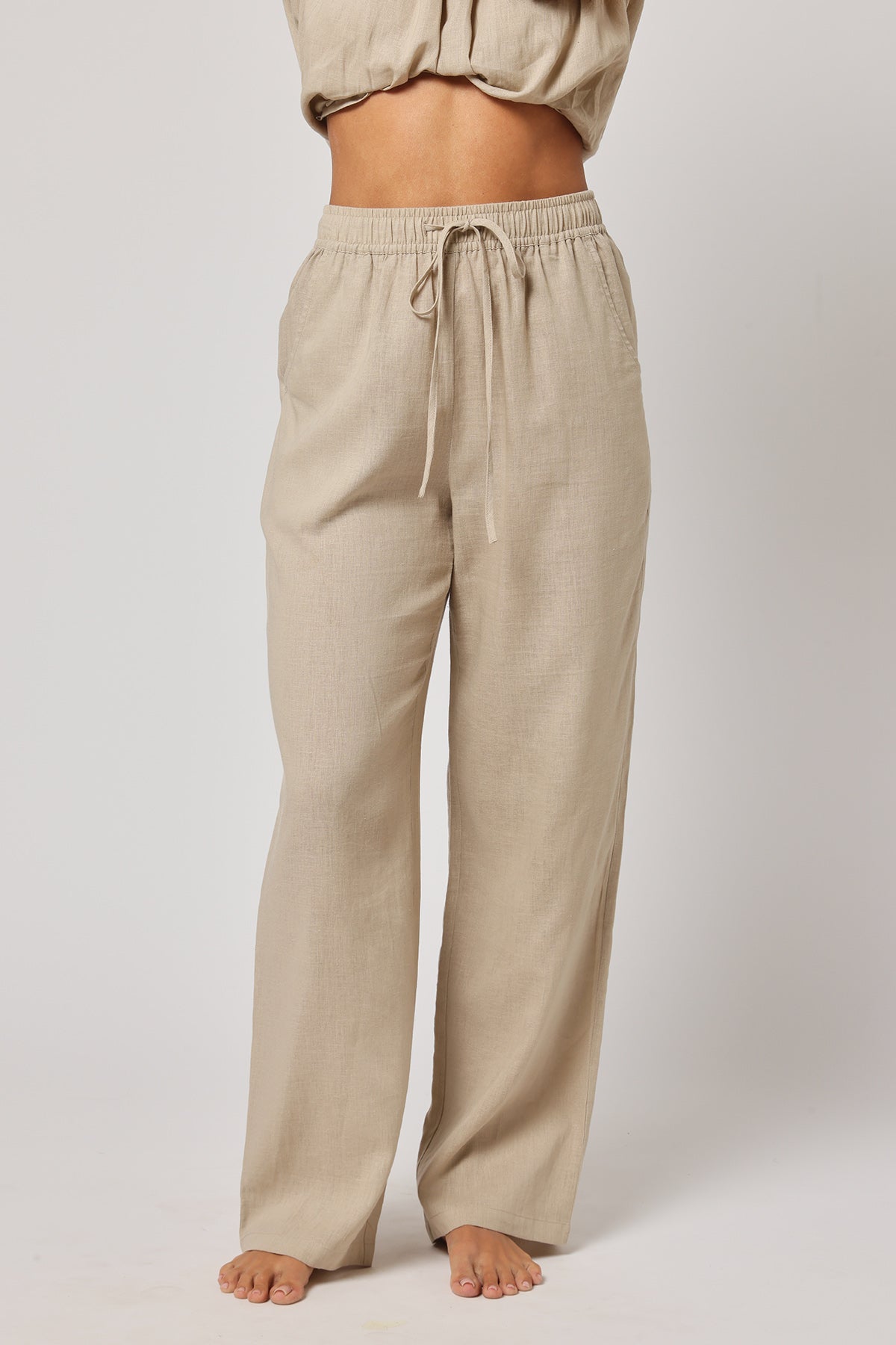 Buy Beige Linen Drawstring Trousers by Ashita Fernandes for Women online at ScrollnShops