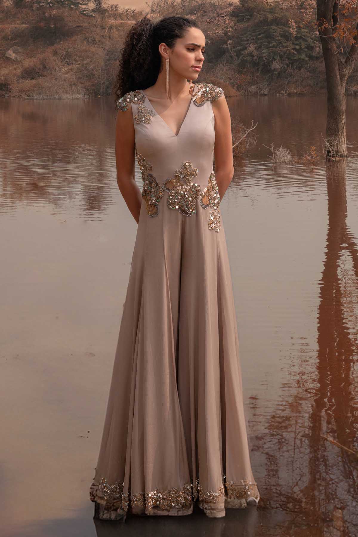 Kaprapan Beige Sleeveless Flared Jumpsuit for women online at ScrollnShops