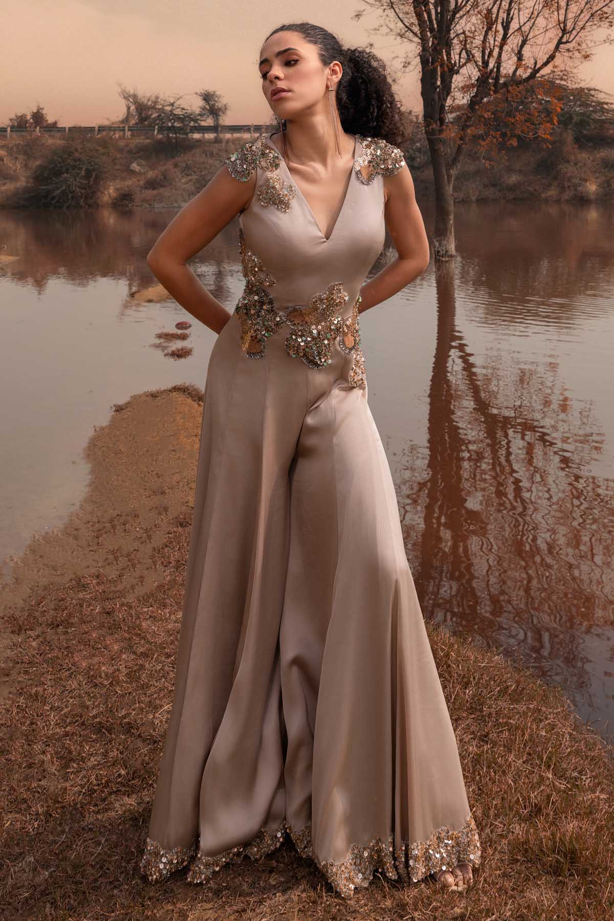 Buy Designer Beige Sleeveless Flared Jumpsuit Online