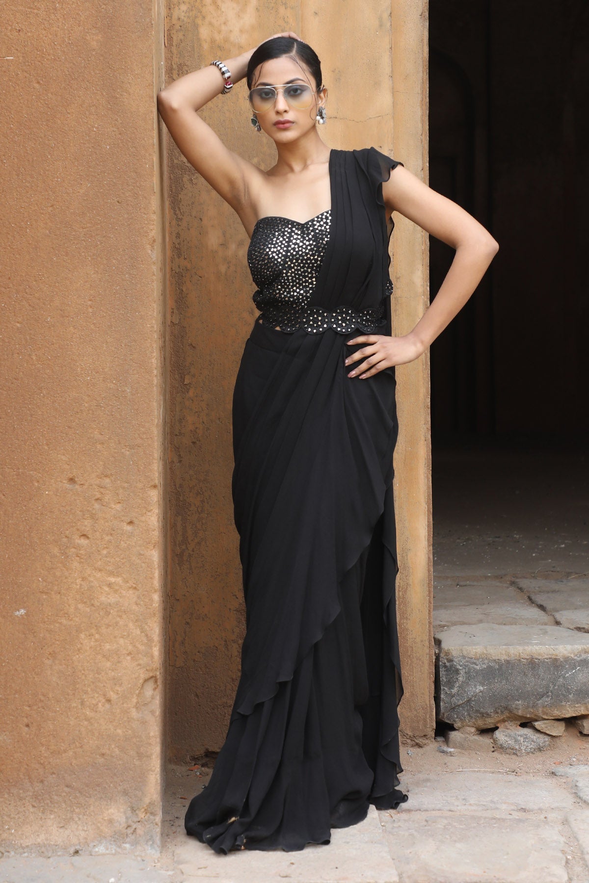 Buy Black Pre-Draped Saree & Corset by Nitisha Kashyap for women online at ScrollnShops