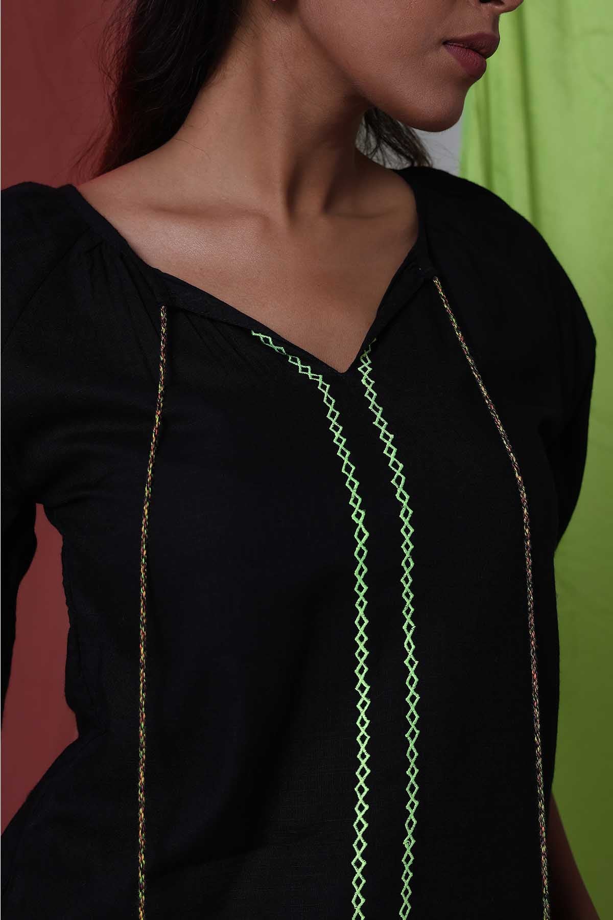 Black Top & Embroidered Pants