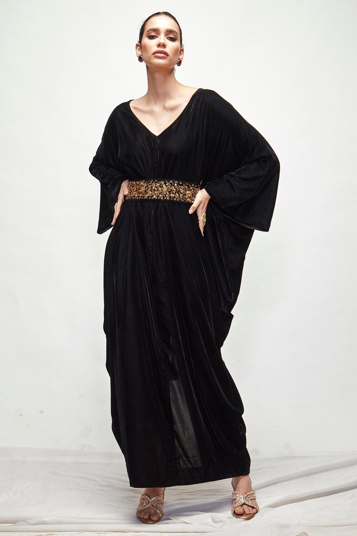 Designer Ranian Black velvet kaftan with extended cowl on the sides for a relaxed fit, back slit and zardosi embroidered belt For women Online at ScrollnShops