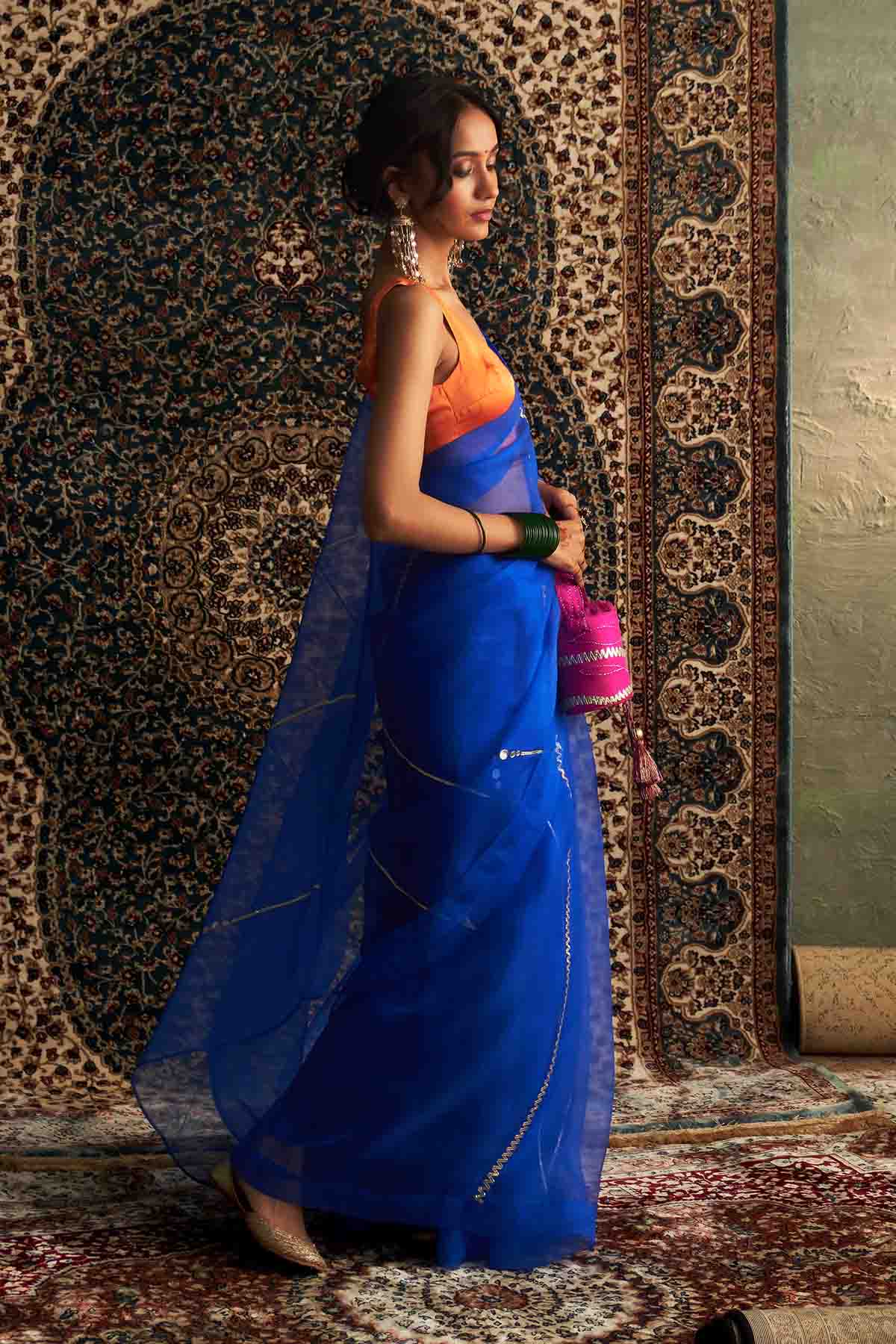 Blue Saree & Saffron Blouse