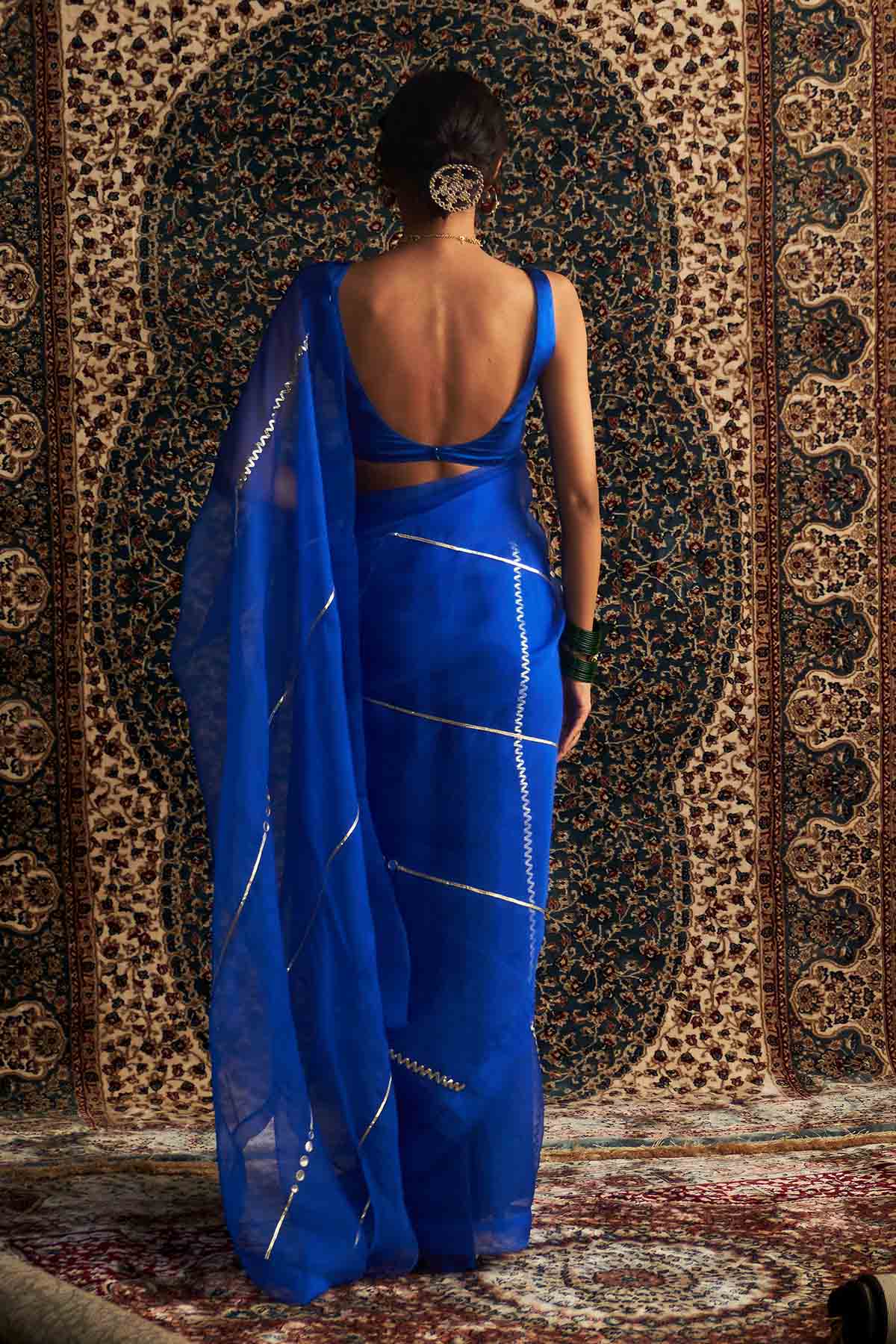 Blue Saree & Sleeveless Blouse