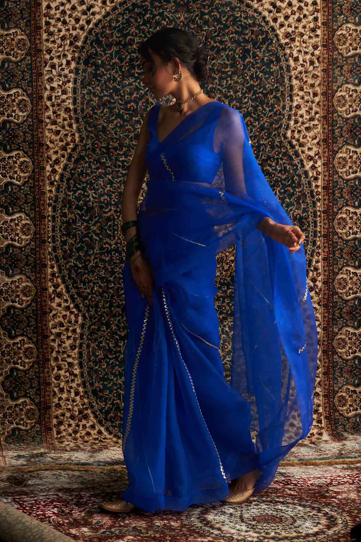 Blue Saree & Sleeveless Blouse