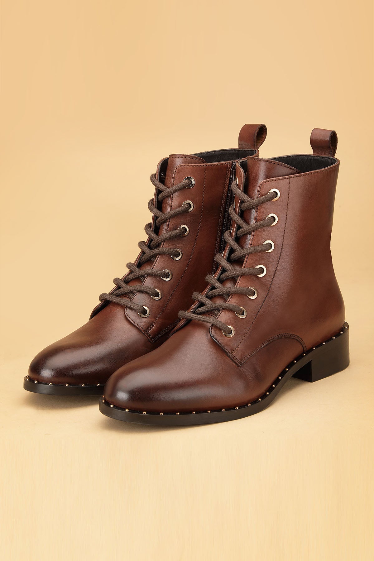 Buy Brown Crust Leather Ankle Boots by Dang Shoes for women online at ScrollnShops