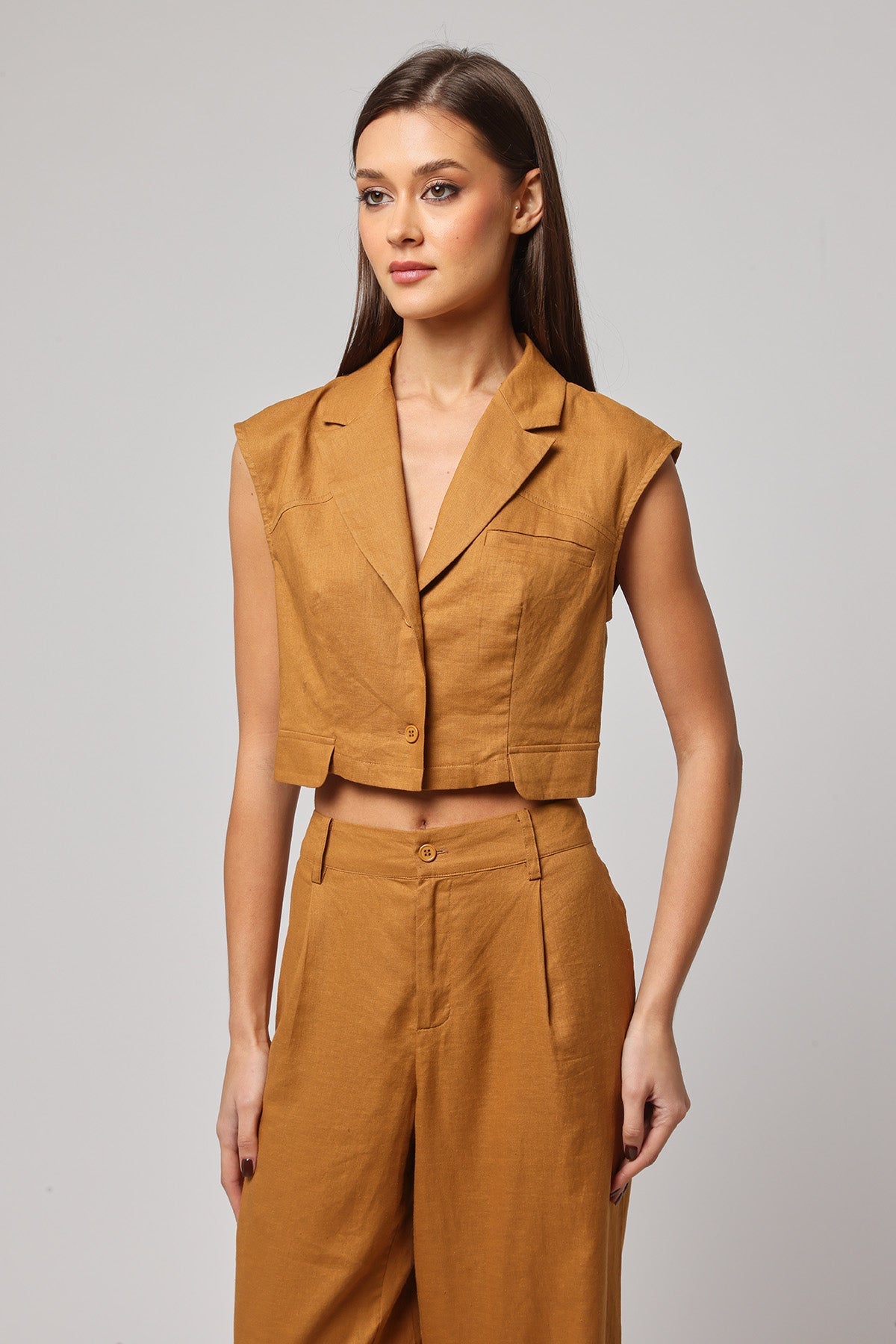 Buy Brown Sleeveless V-Neck Blazer by Ashita Fernandes for Women online at ScrollnShops