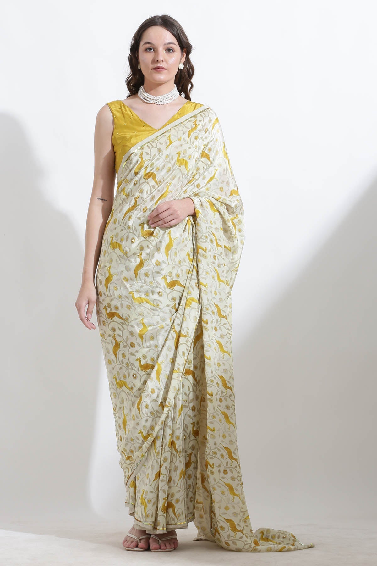 Designer Kusmi Sunlit Tapestry: Flowing Crepe Saree with Delicate Pearls For Women at ScrollnShops