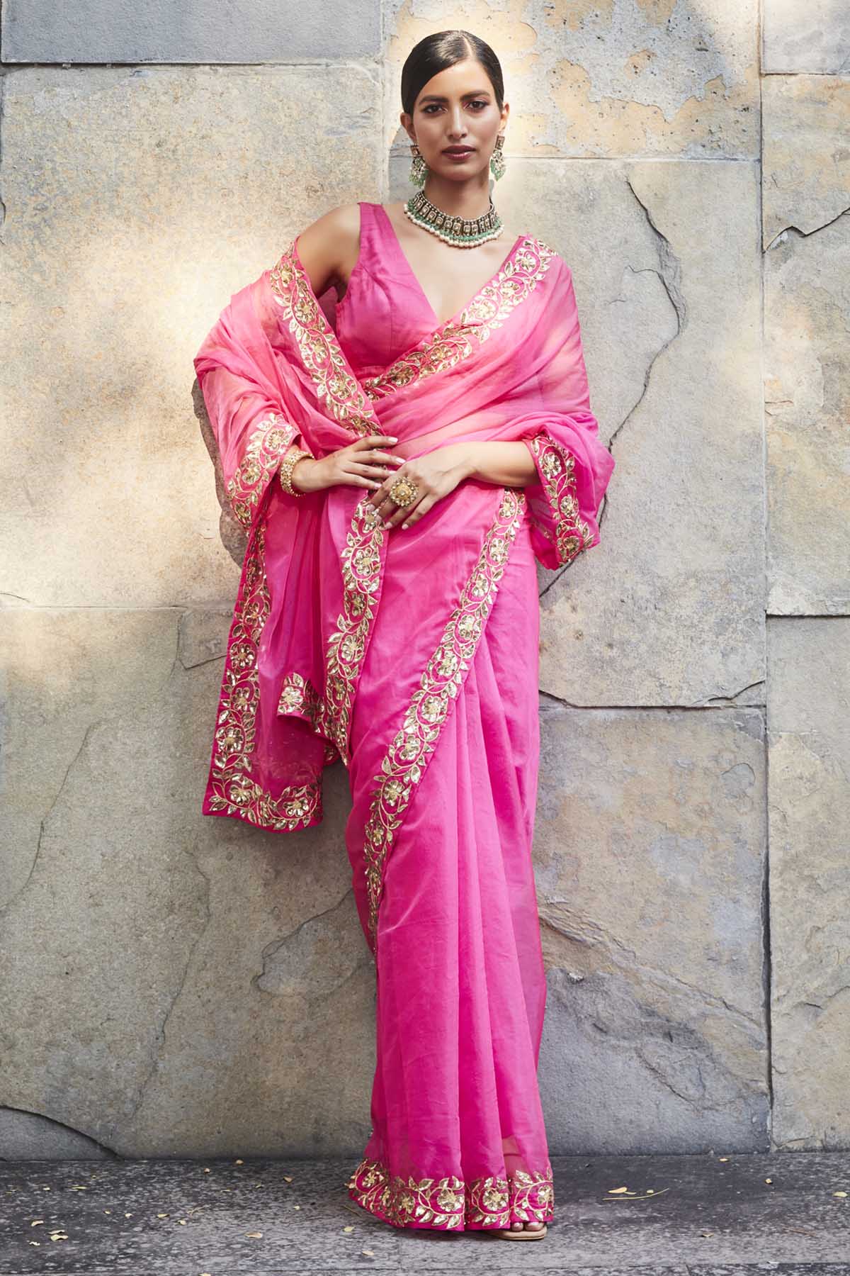Designer Ranian Fuchsia silk organza saree with delicate floral pattern border in 3D sequins and zari. The saree comes with a plain satin silk blouse with a back hook For women Online at ScrollnShops