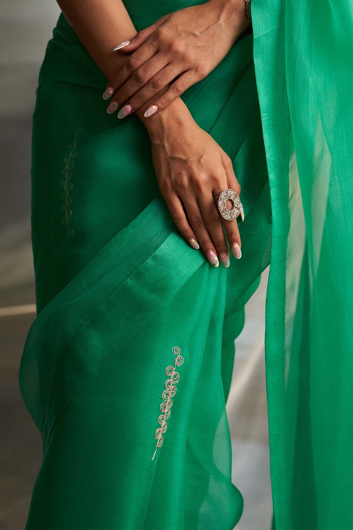 Green Saree & Sleeveless Blouse