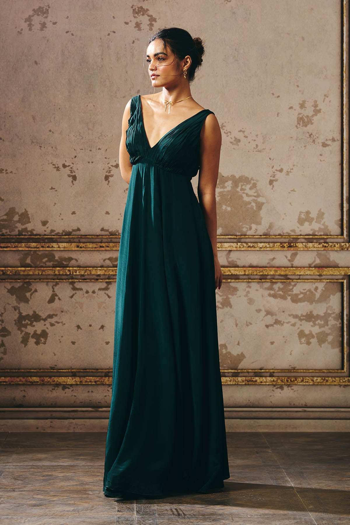 Green Sleeveless Deep Neck Gown