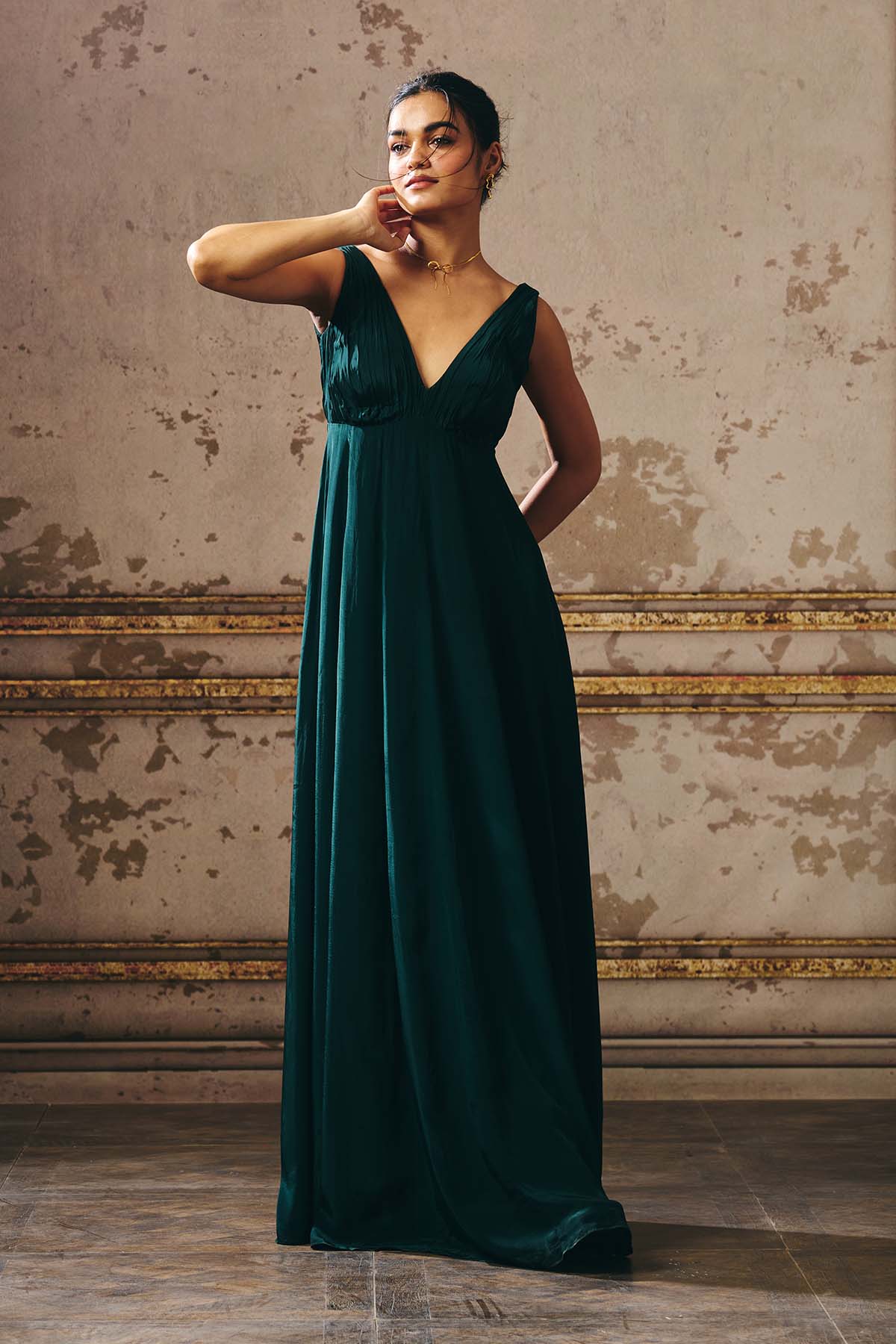 Green Sleeveless Deep Neck Gown for Women by Masumi Mewawalla Green Sleeveless Deep Neck Gown for Women by Masumi Mewawalla