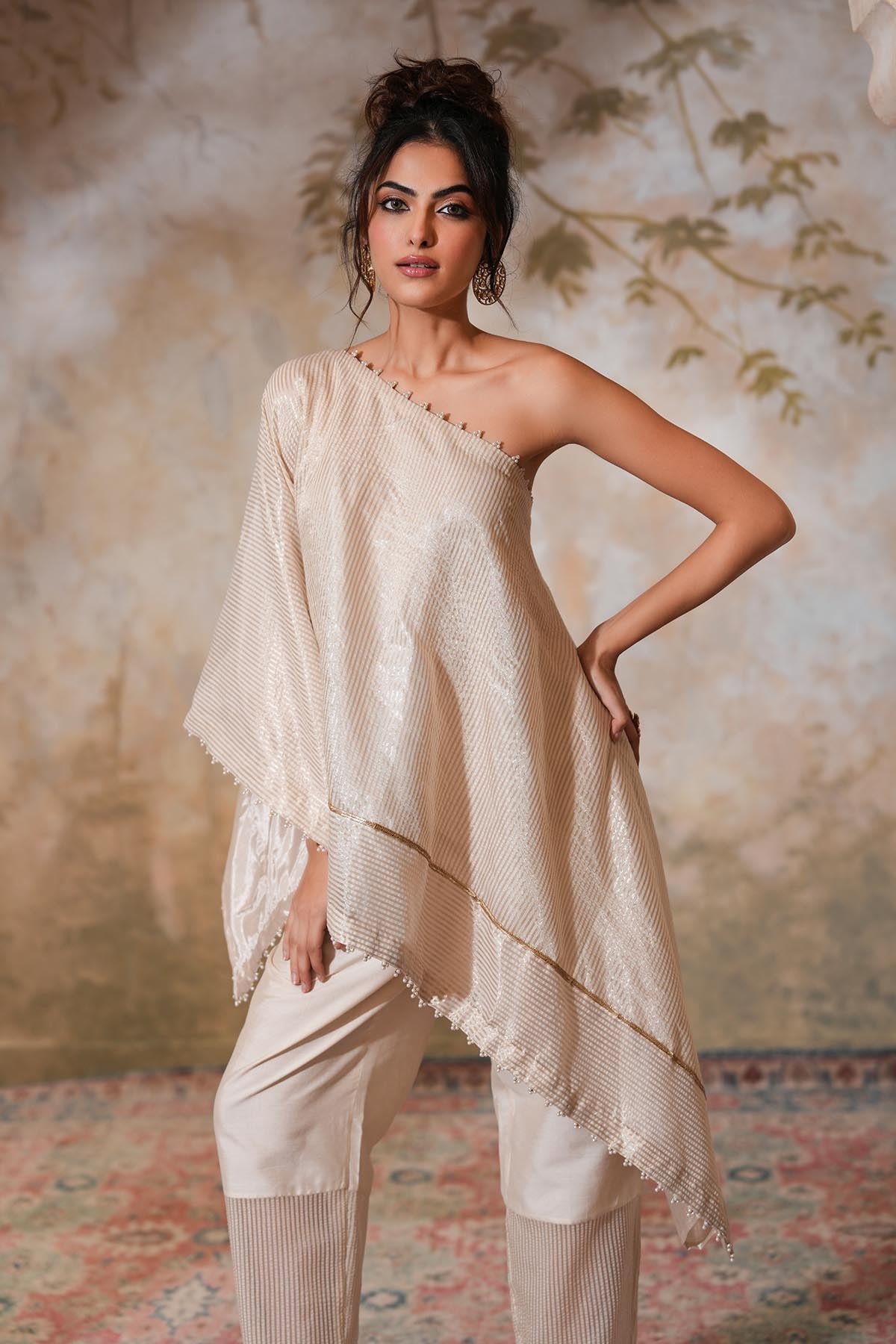 Buy Ivory One Shoulder Zari Kaftan by Ugna by Unnati for women online at ScrollnShops