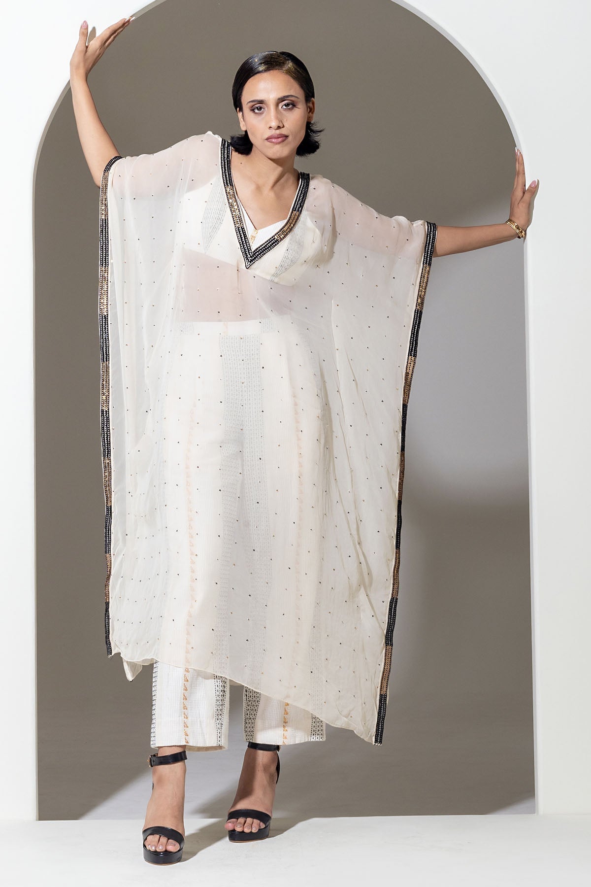 Designer Kusmi Luminous Luxe: Ivory Beaded Kaftan with a Dazzling Plunge For Women at ScrollnShops