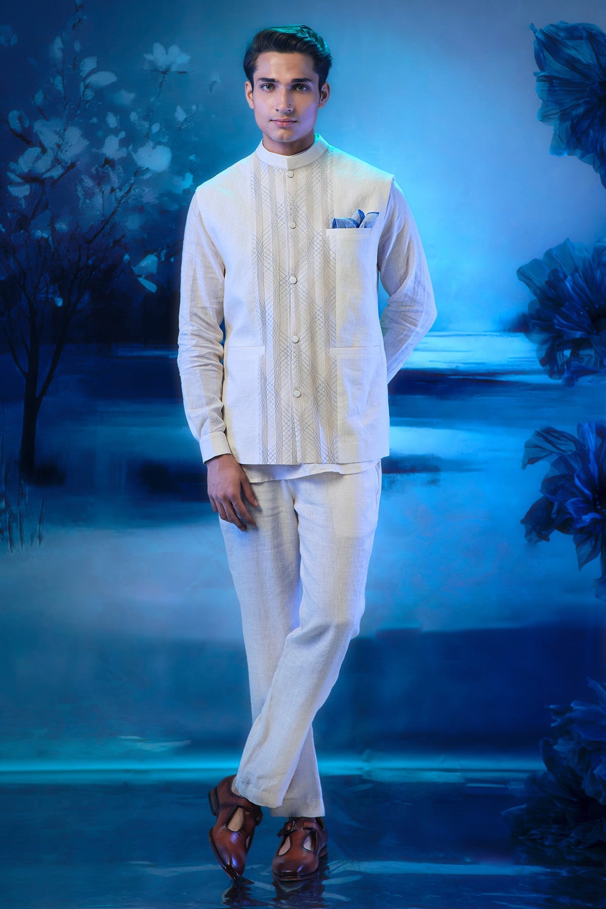 Buy Ivory Pintuck Nehru Jacket Set by Mandira Wirk for men online at ScrollnShops