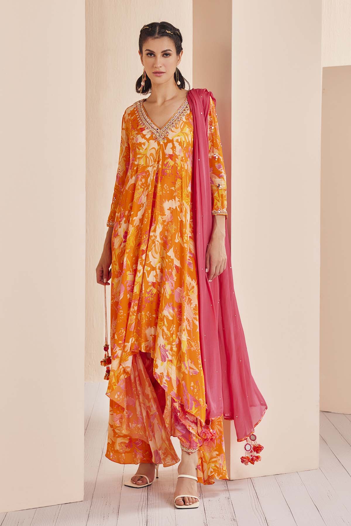 Buy Orange Embroidered Tunic & Dhoti Set by Mandira Wirk