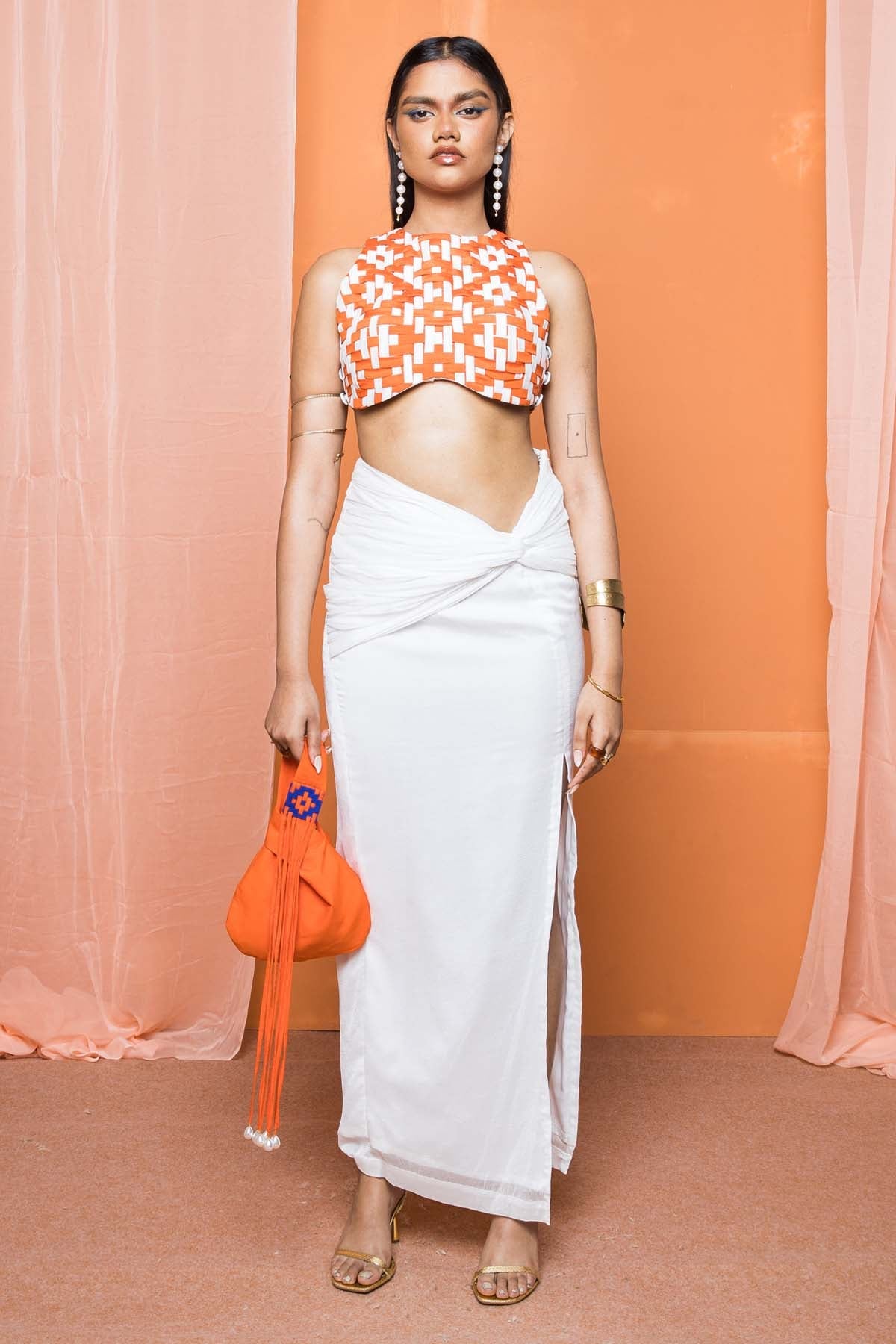 Shivanii Orange Sleeveless Crew Neck Top for women online at ScrollnShops