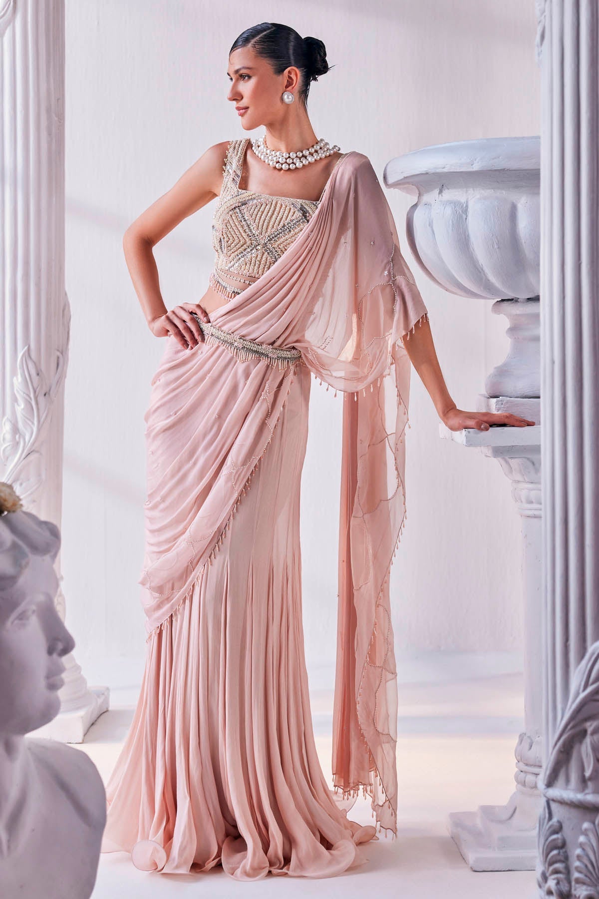 Buy Peach Chiffon Draped Saree by Mandira Wirk