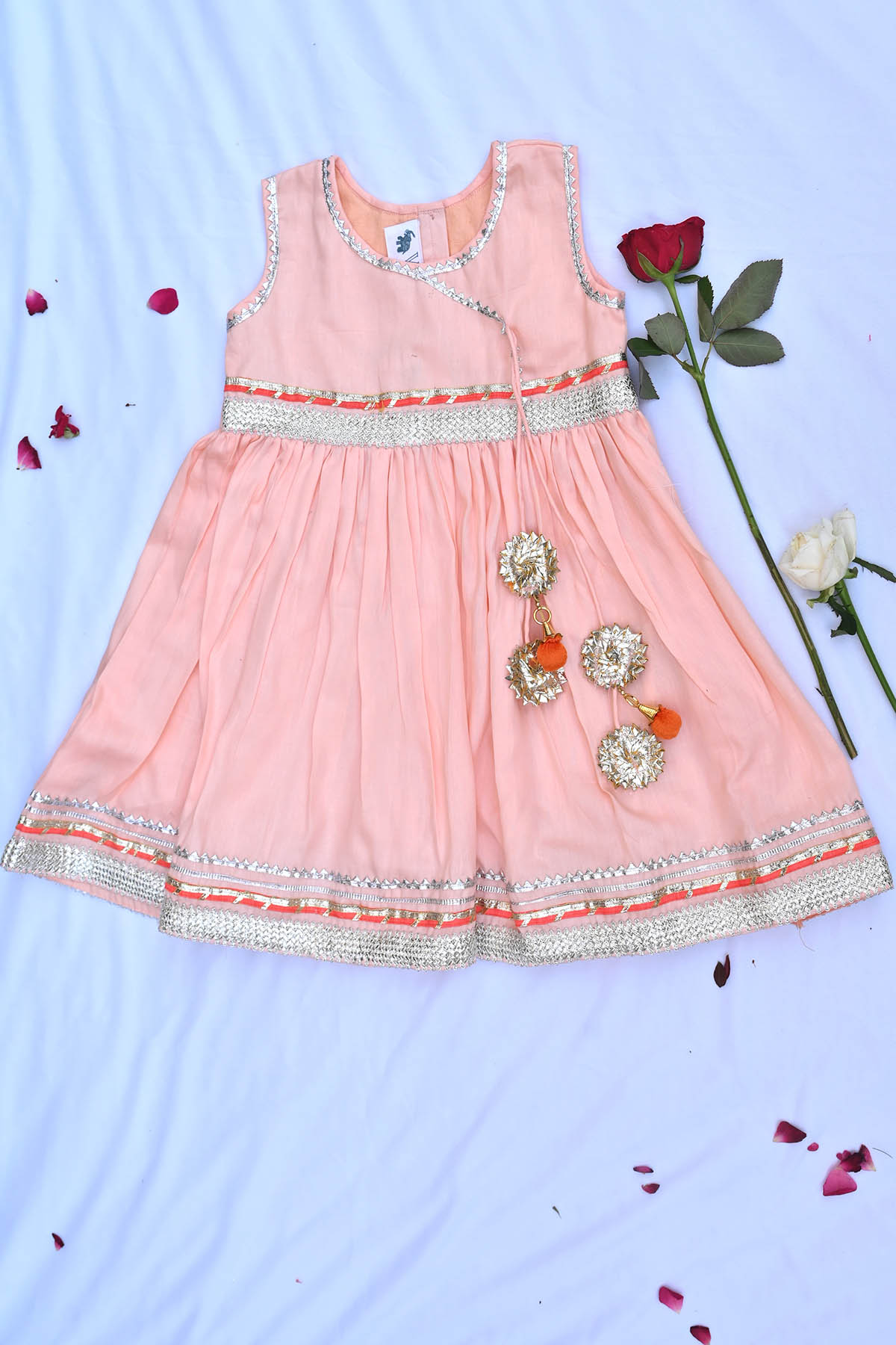 Buy Peach Cotton Sleeveless Dress by ViYa for Girls online at ScrollnShops