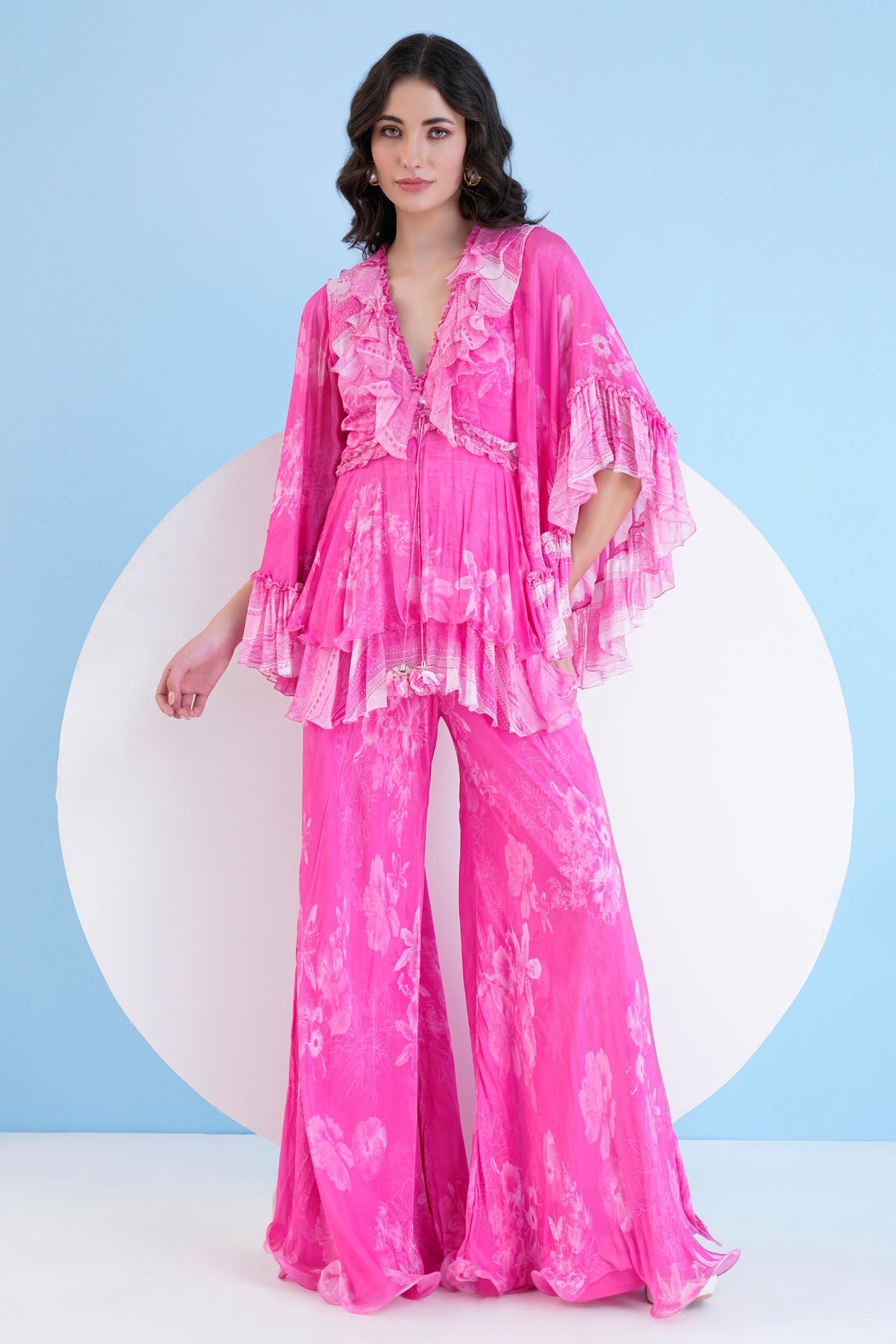 Buy Pink Flared Chiffon Jumpsuit by Mandira Wirk