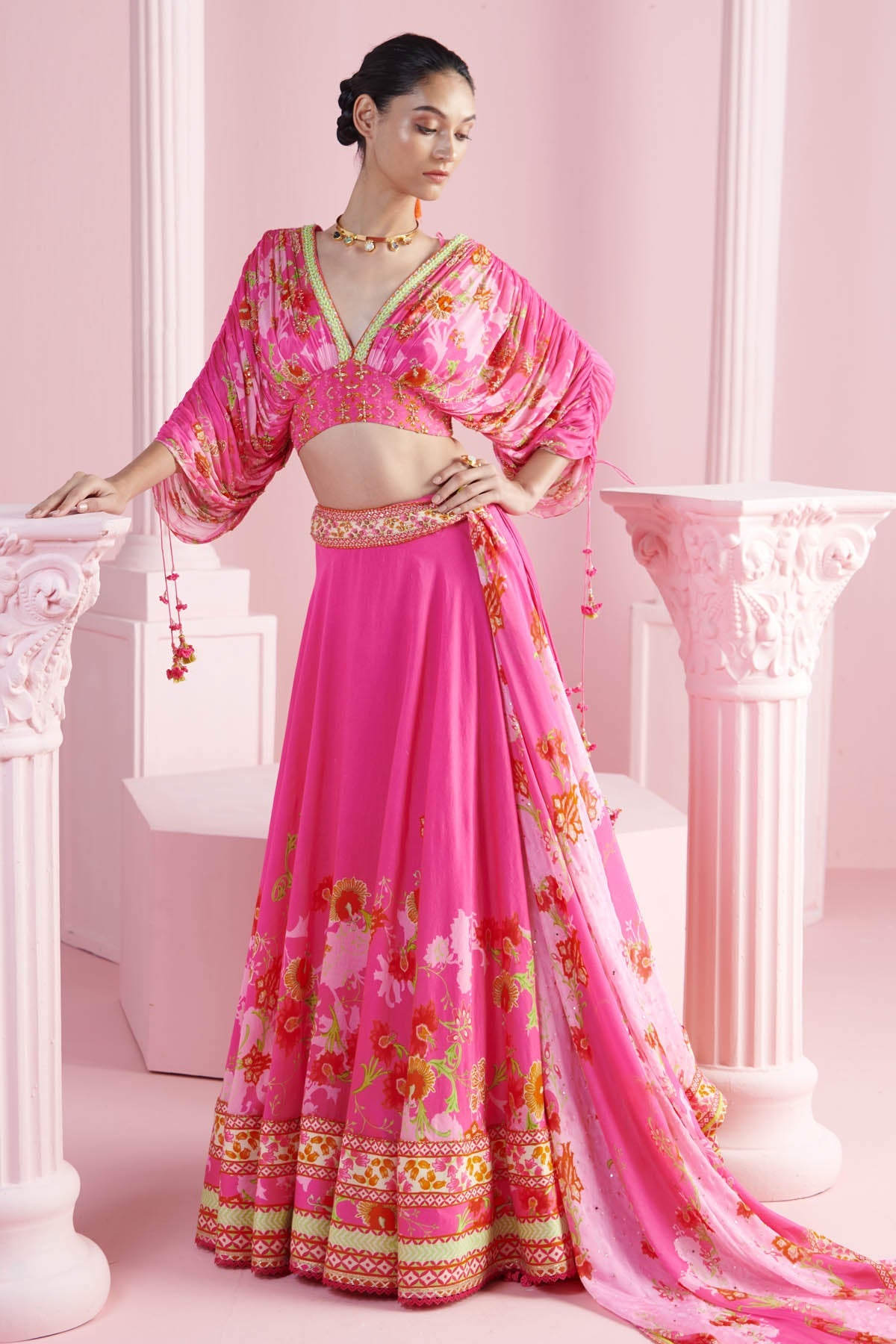 Buy Pink Printed Drape Lehenga Set by Mandira Wirk