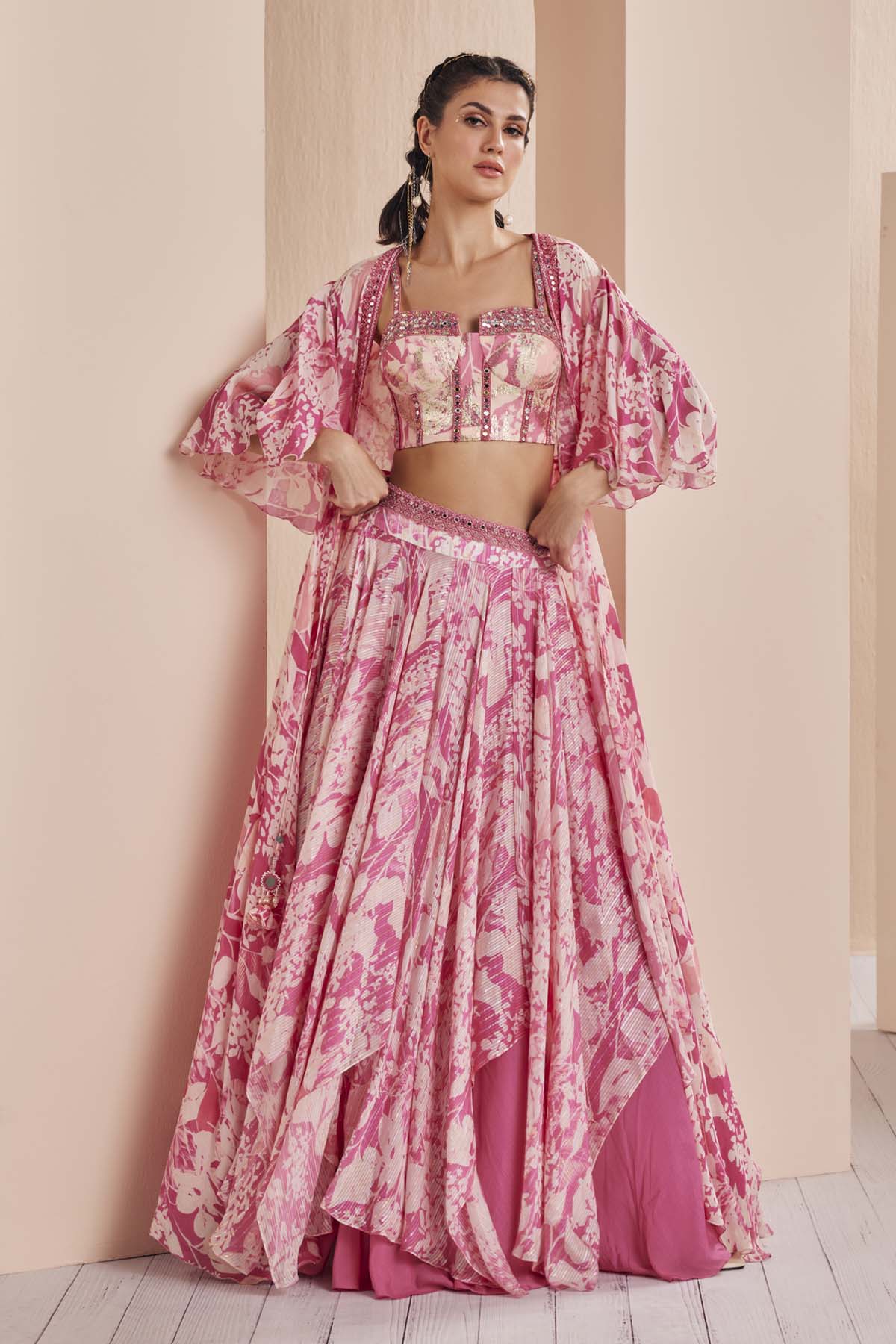 Buy Pink Printed Layered Lehenga Set by Mandira Wirk
