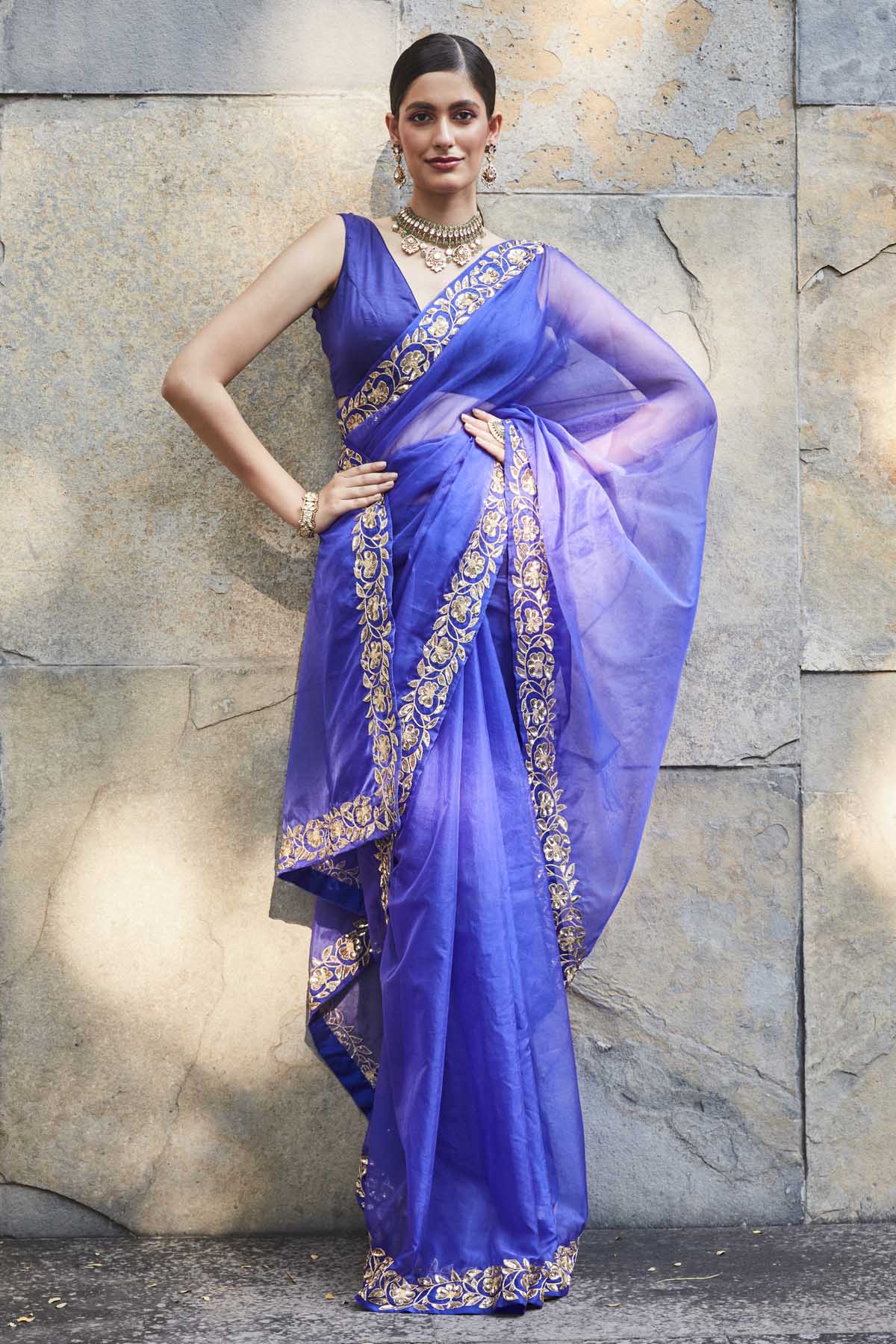 Designer Ranian Purple silk organza saree with delicate floral pattern border in 3D sequins and zari. The saree comes with a plain satin silk blouse with a back hook For women Online at ScrollnShops