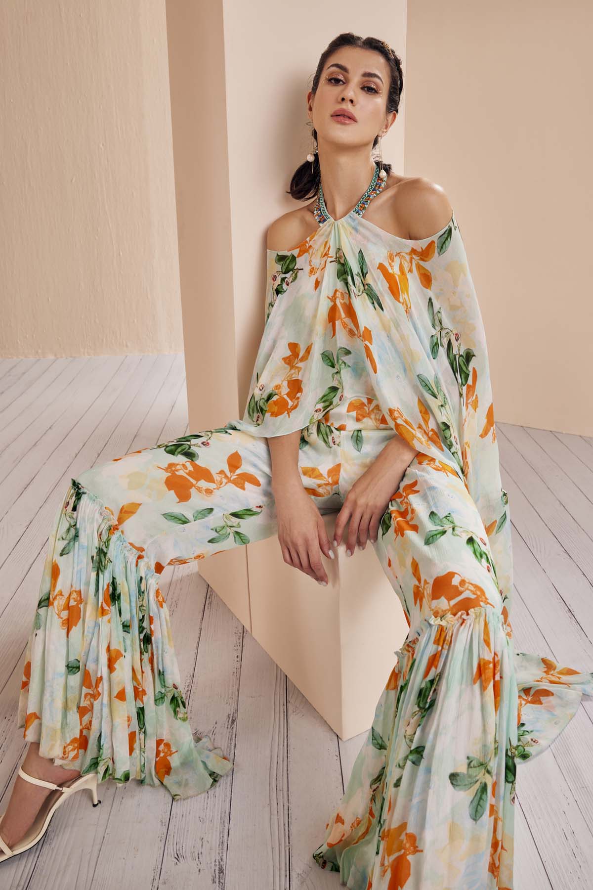 Buy Sage Green Floral Halter Neck Jumpsuit by Mandira Wirk