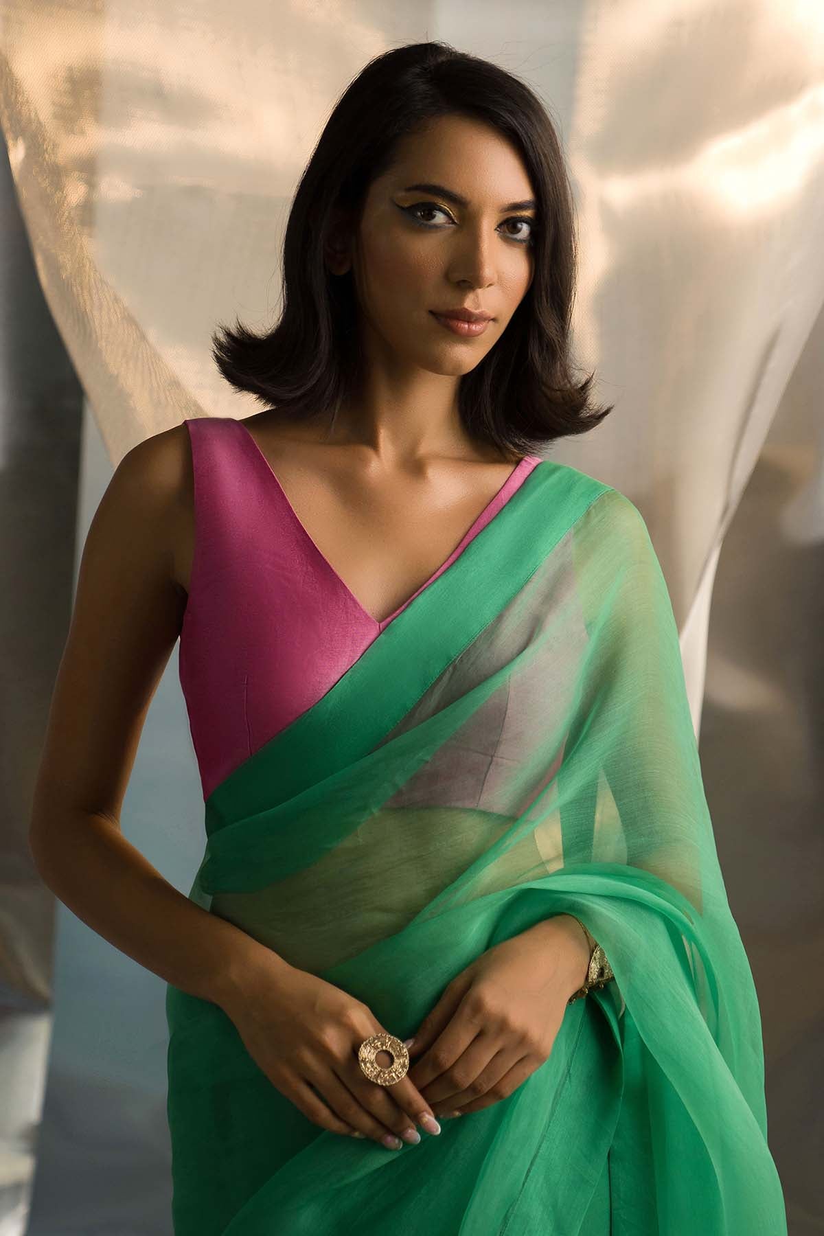 Saree & Pink Sleeveless Blouse