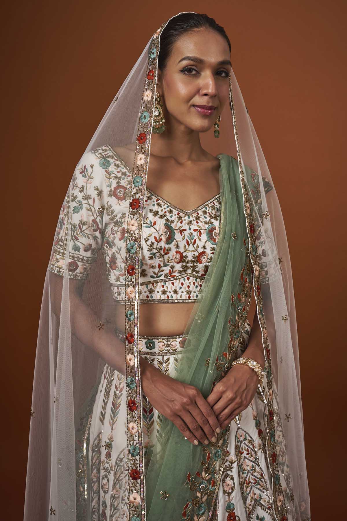 Ivory Raw Silk Embroidered Lehenga Set