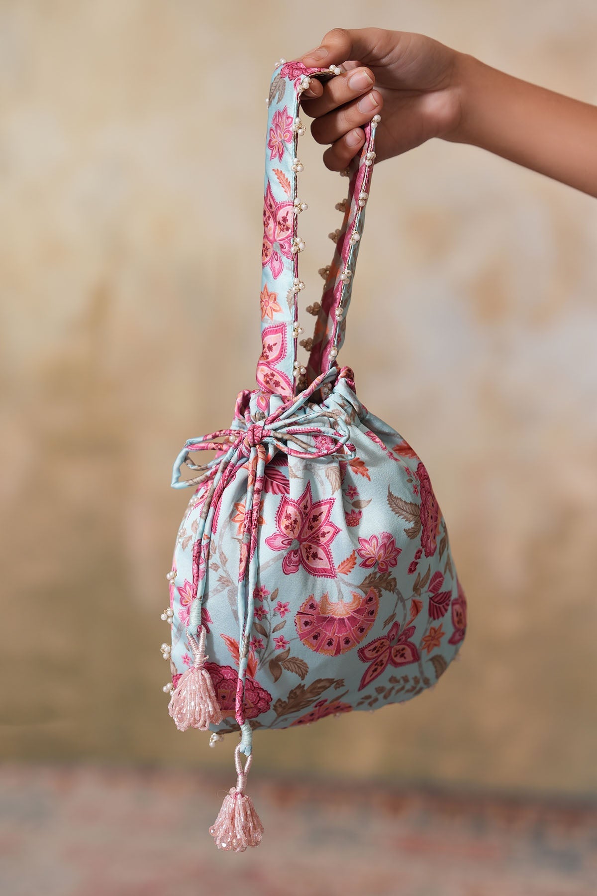 Buy Sky Blue Gota Work Printed Potli by Ugna by Unnati for women online at ScrollnShops