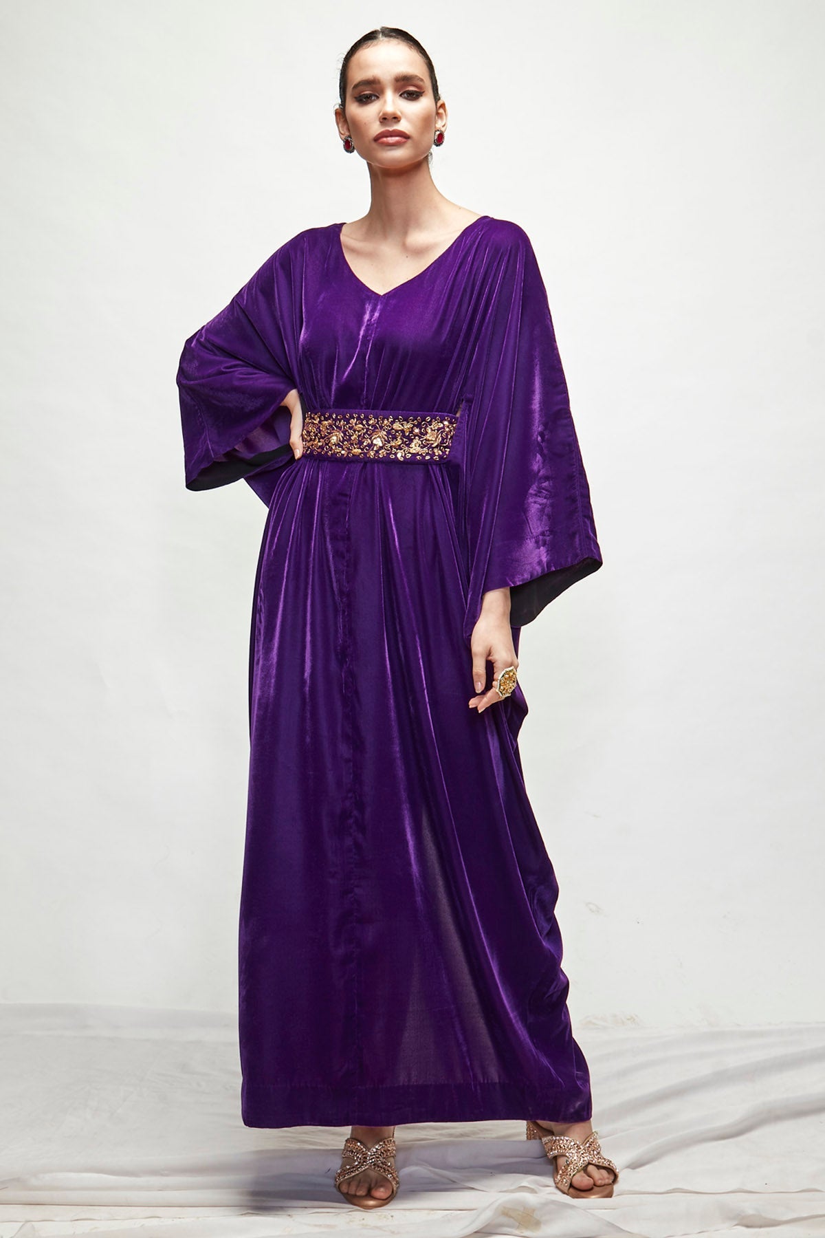 Designer Ranian Violet velvet kaftan with extended cowl on the sides for a relaxed fit, back slit and zardosi embroidered belt For women Online at ScrollnShops