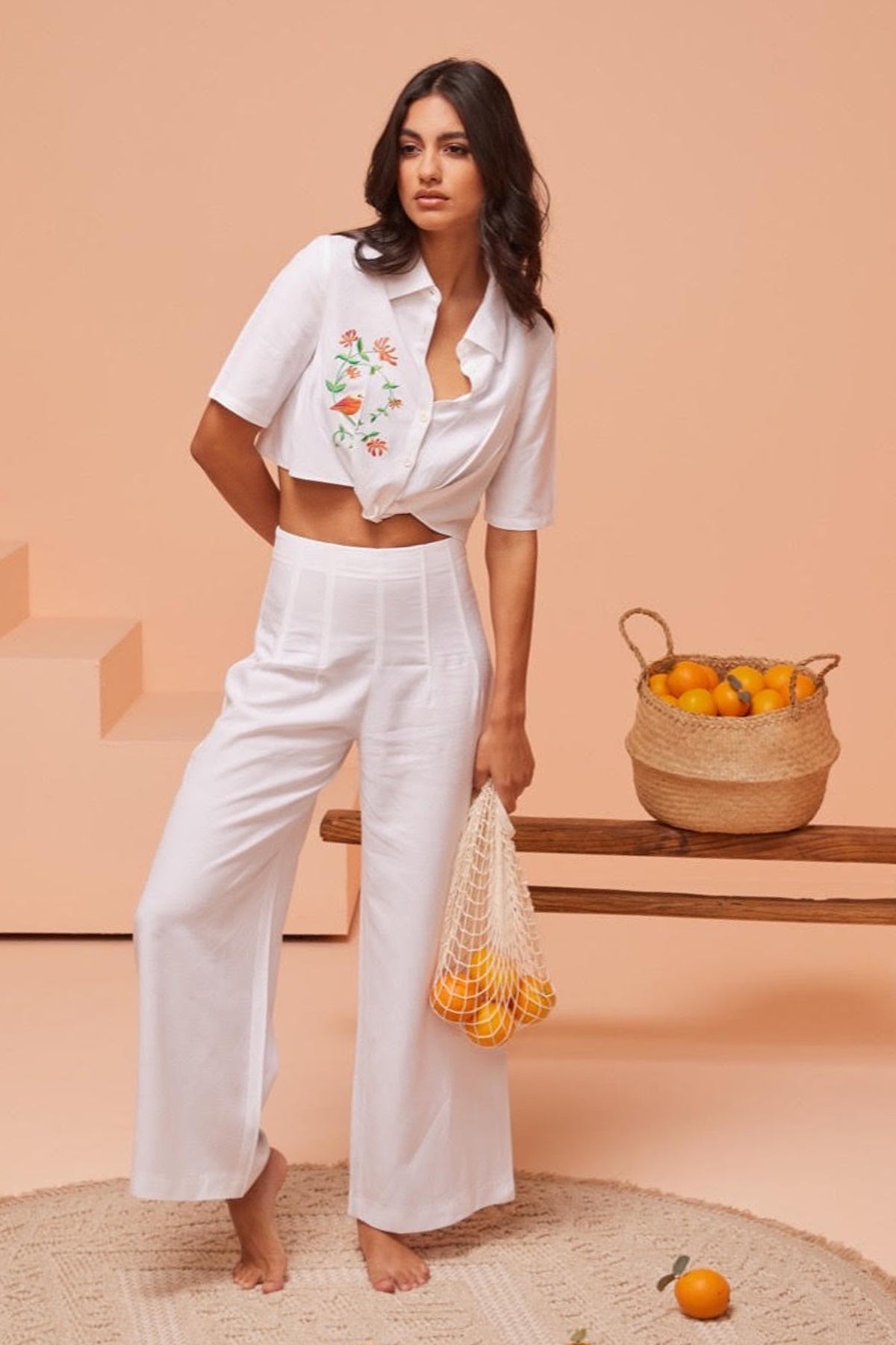 Buy White Wide-Leg Pleated Pants by Ashita Fernandes for Women online at ScrollnShops