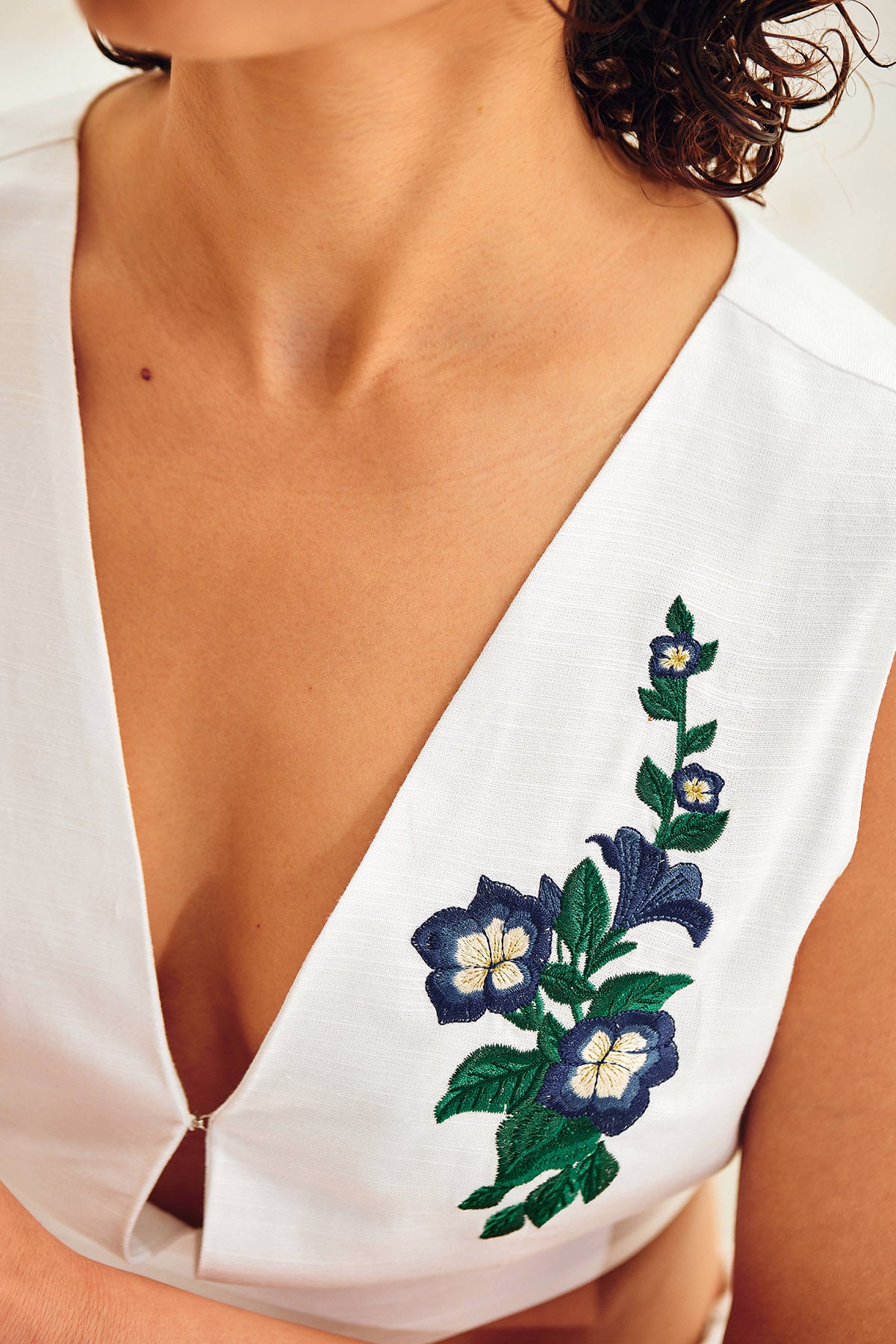 White Sleeveless Deep V-Neck Top