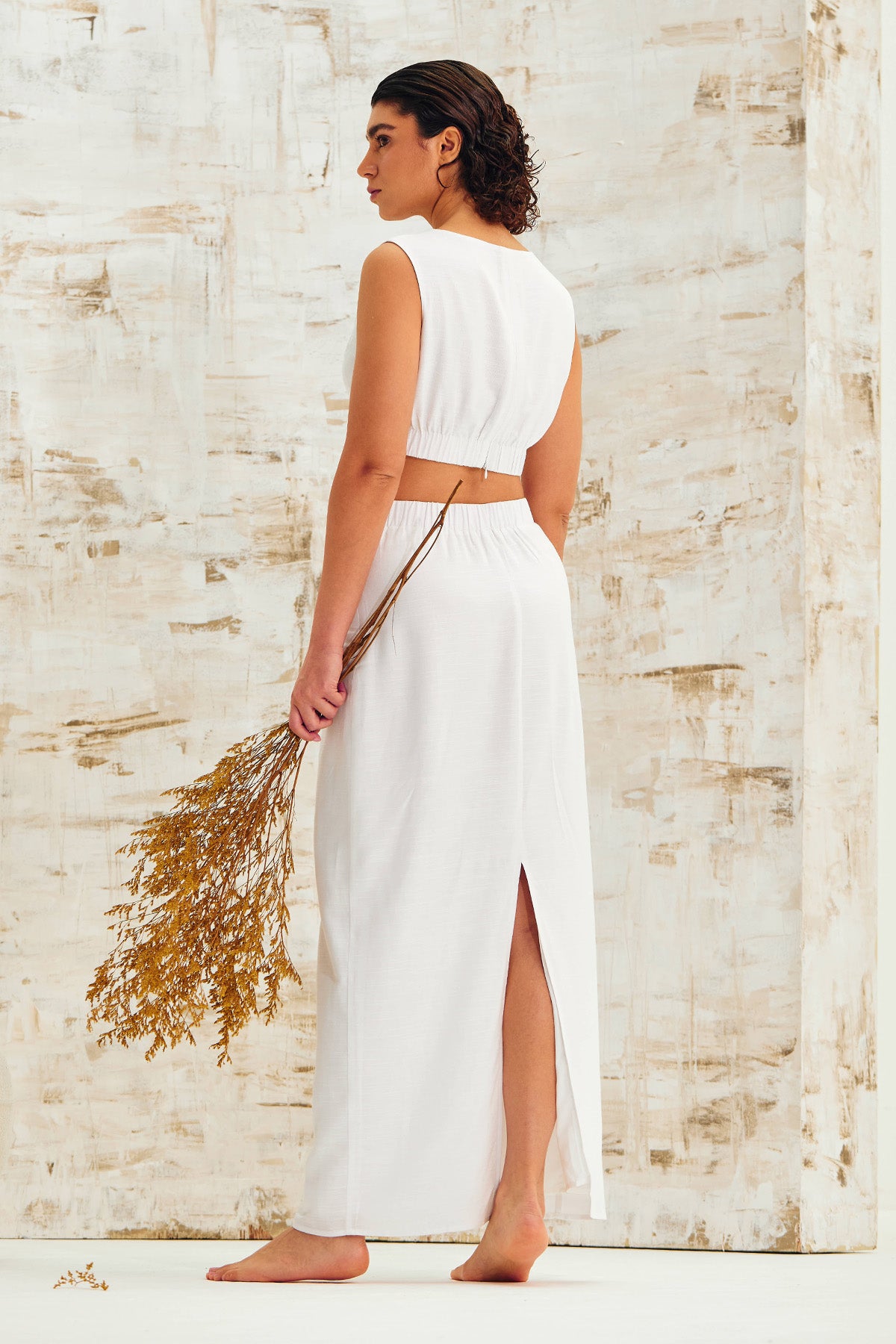 White Sleeveless Deep V-Neck Top