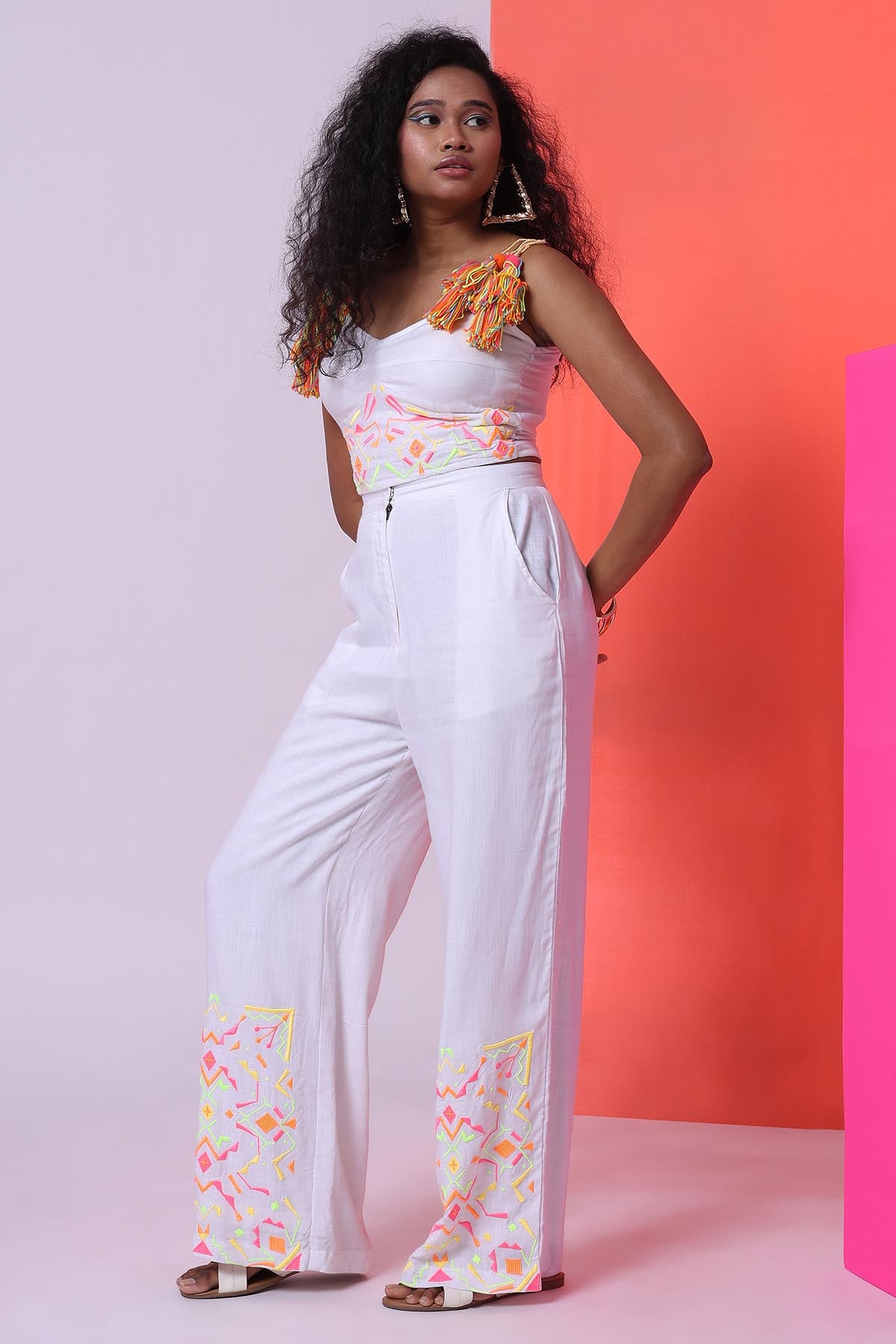 White Sleeveless Top & Trousers