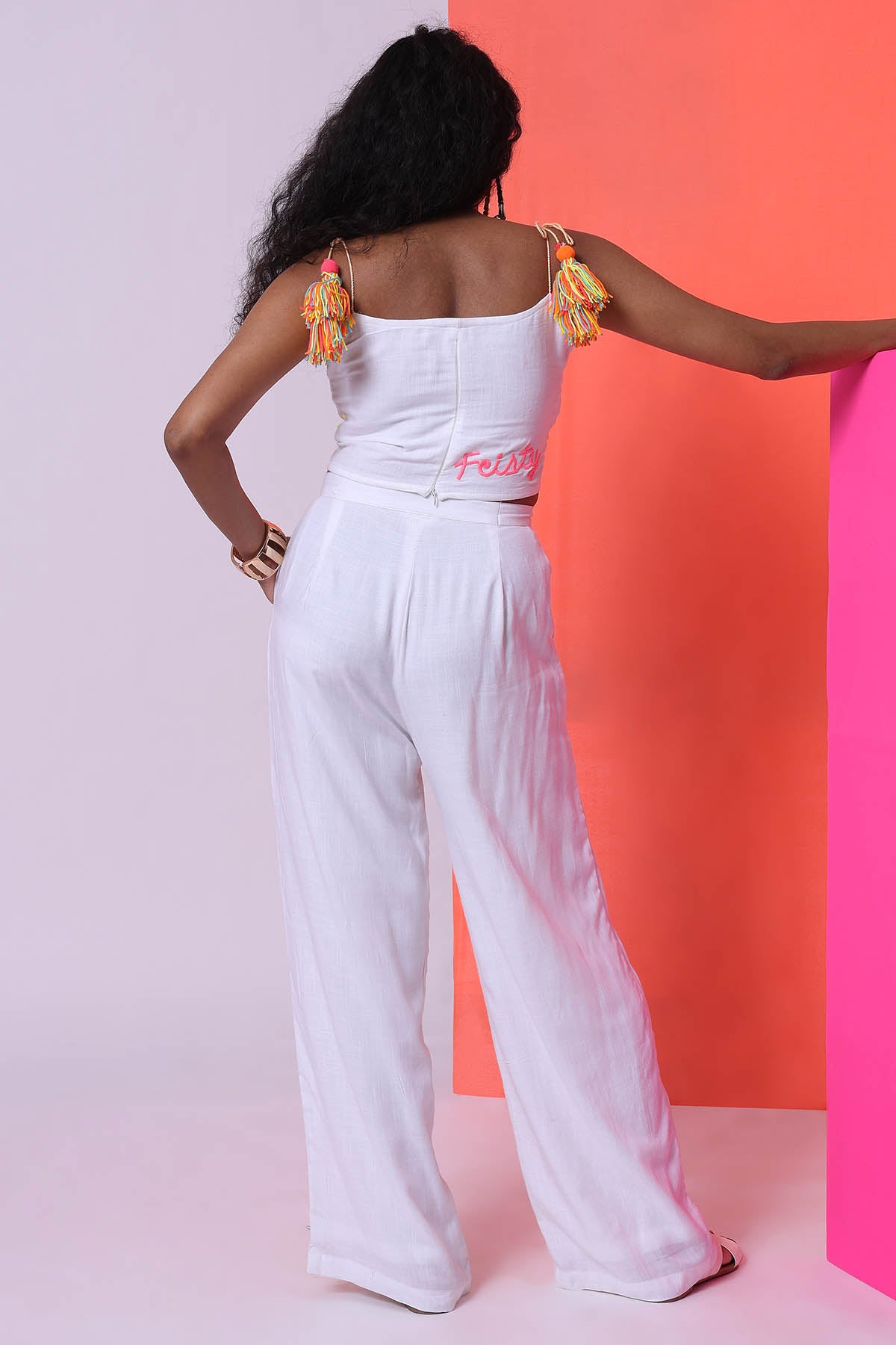 White Sleeveless Top & Trousers