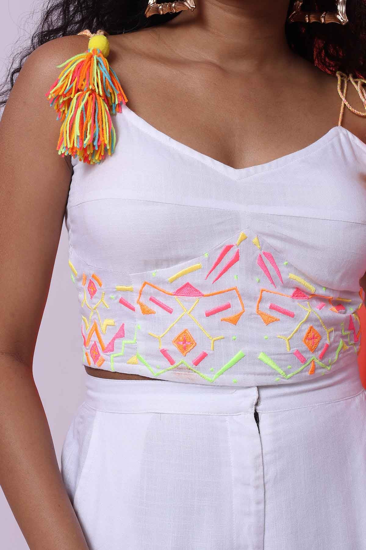 White Sleeveless Top & Trousers