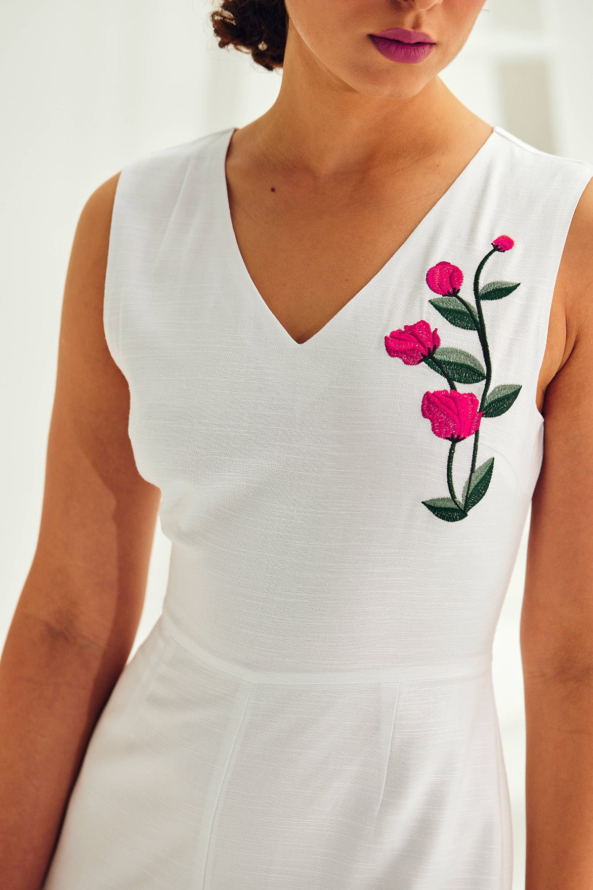 White Sleeveless V-Neck Jumpsuit