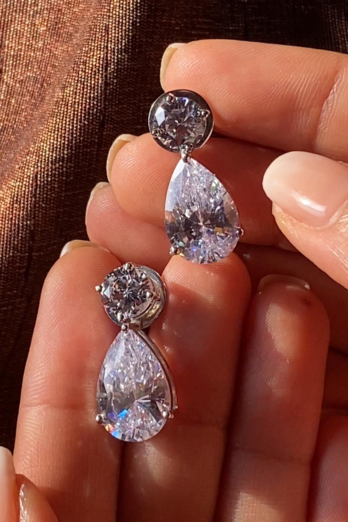 White Teardrop Danglers Earrings