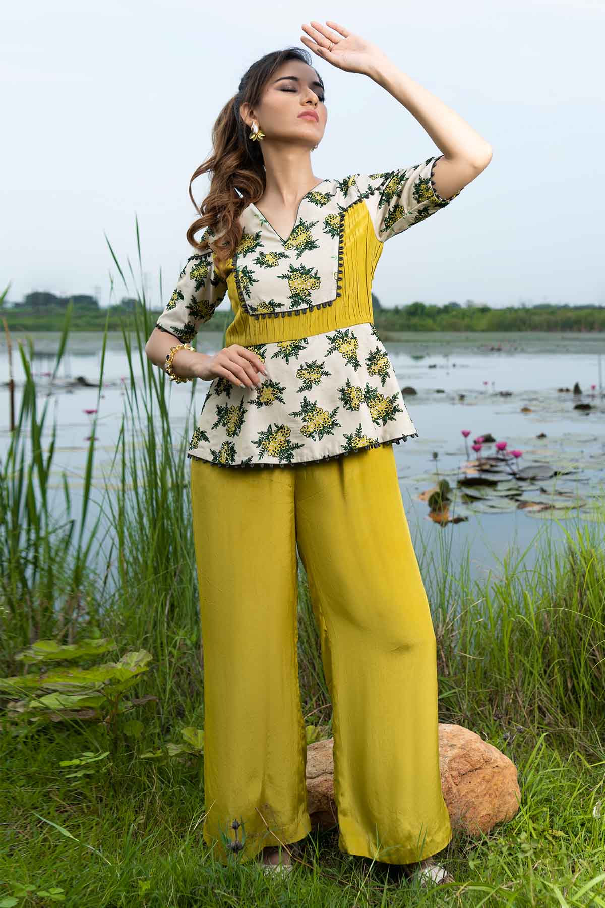 Sejal Kamdar Yellow Peplum Flared Jumpsuit for women online at ScrollnShops