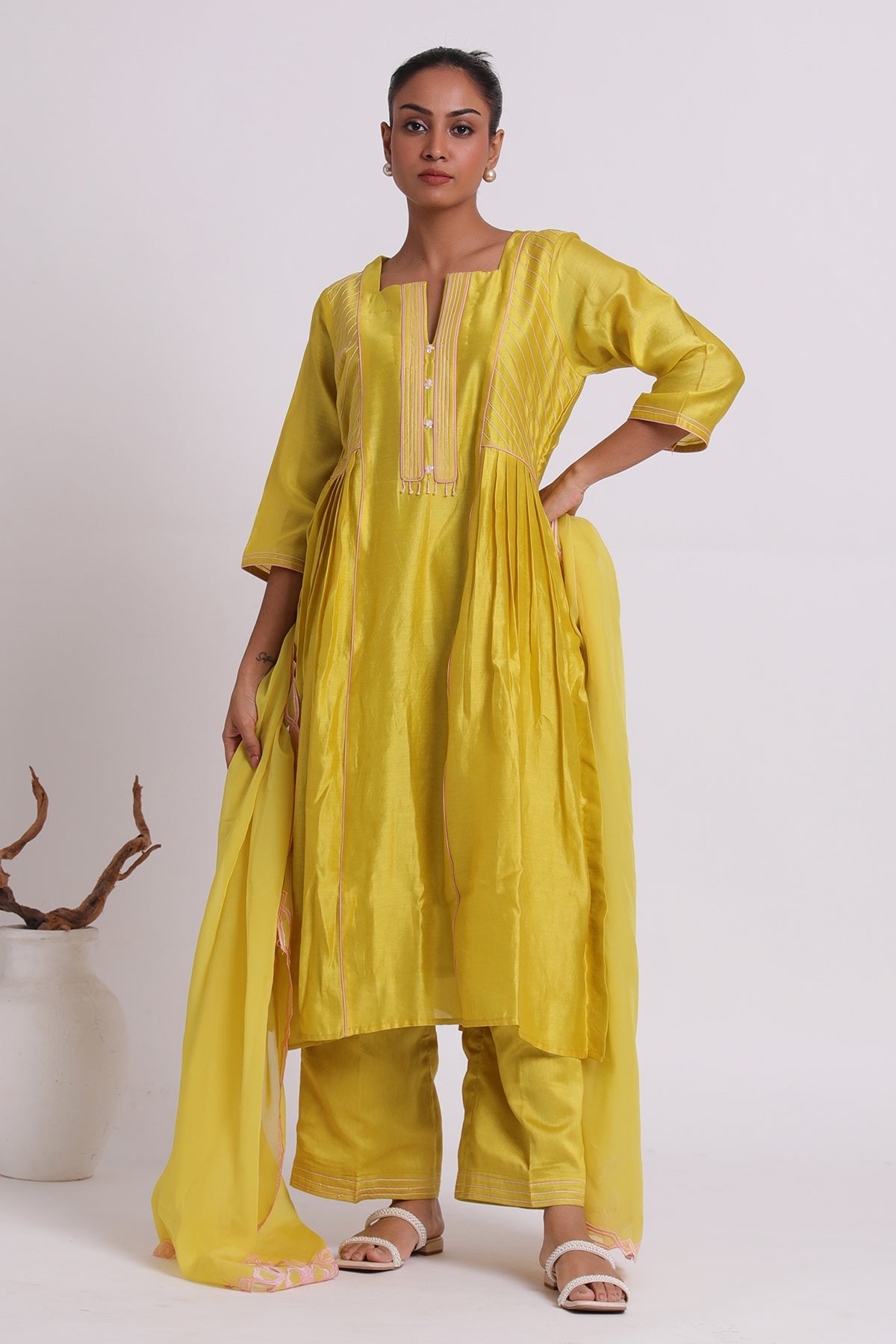 Buy Yellow Pleated Flared Kurta Set by Seher Studio for women online at ScrollnShops
