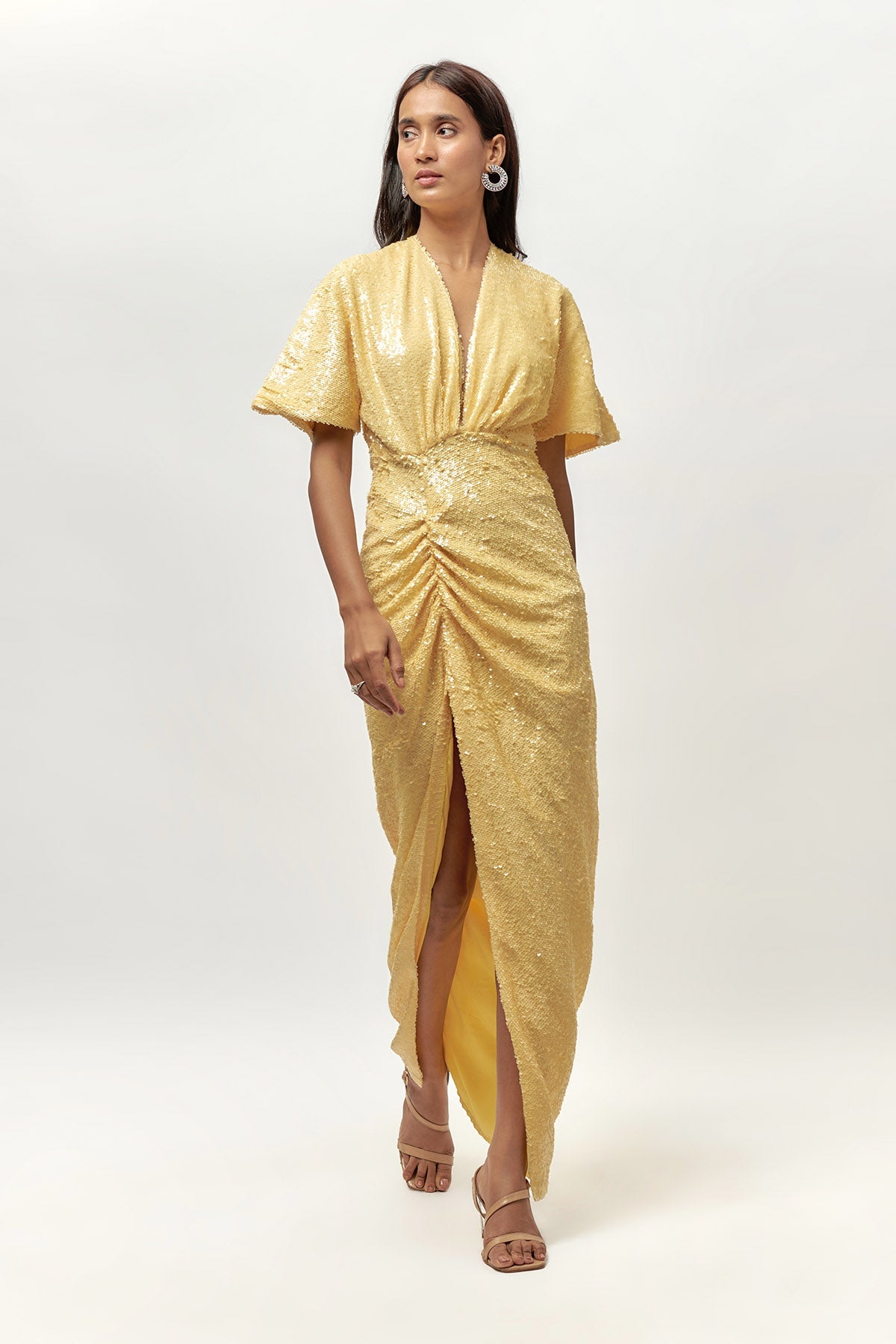 Buy Yellow Sequins Drape Slit Dress by Emblaze for women online at ScrollnShops