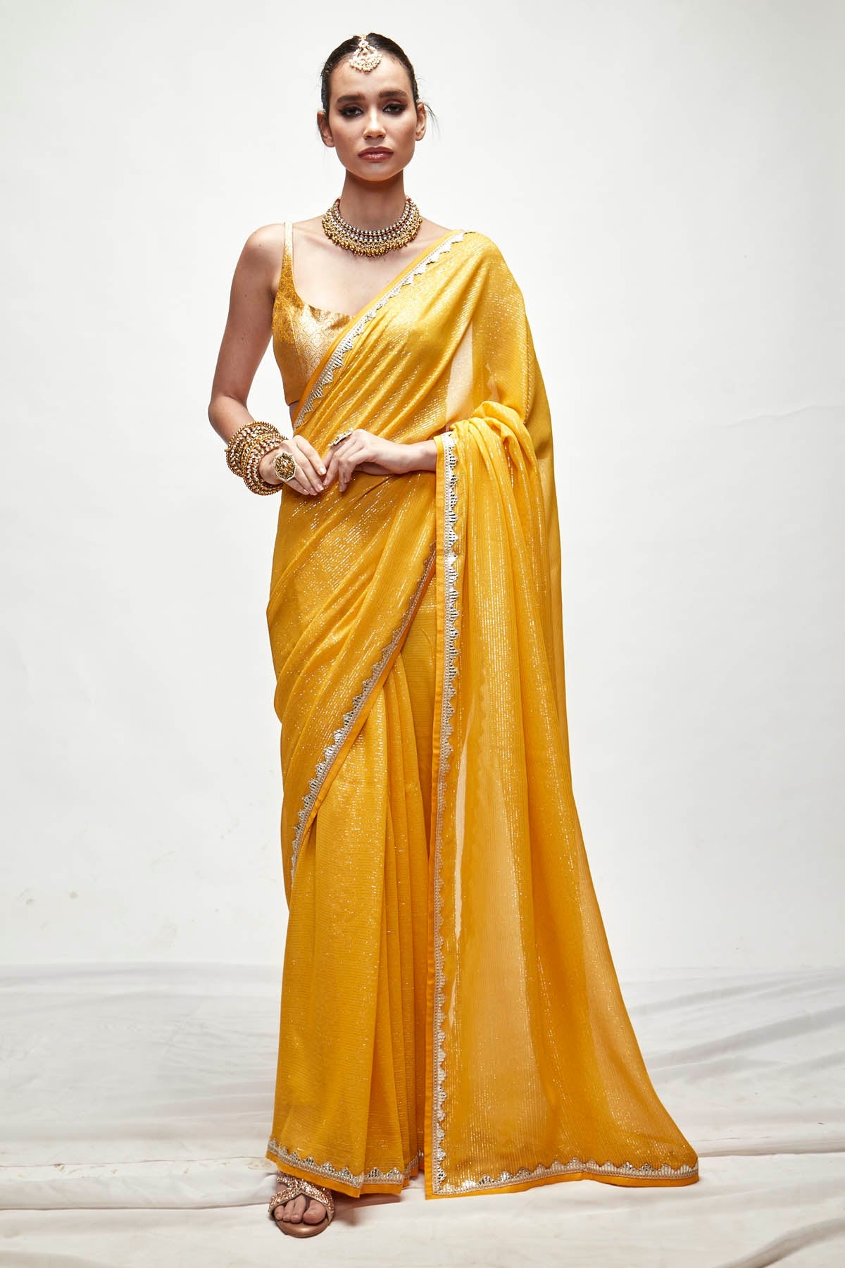 Designer Ranian Dandelion yellow silk georgette saree with self woven gold and silver metallic threads, gota and silk satin paired with silk brocade champagne matt zari blouse For Women Online at ScrollnShops