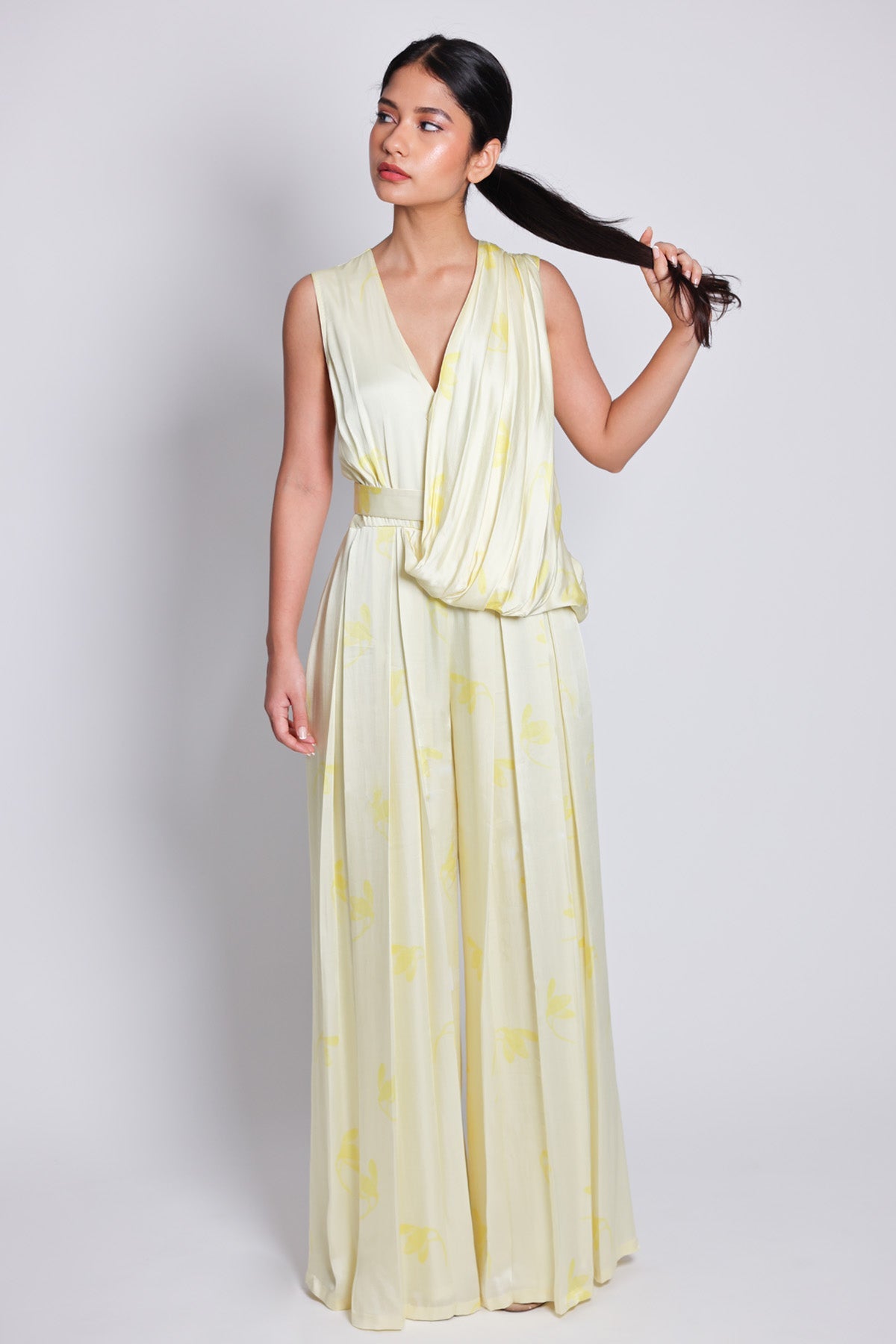 Arya Giri Yellow Sleeveless Drape Jumpsuit for women online at ScrollnShops