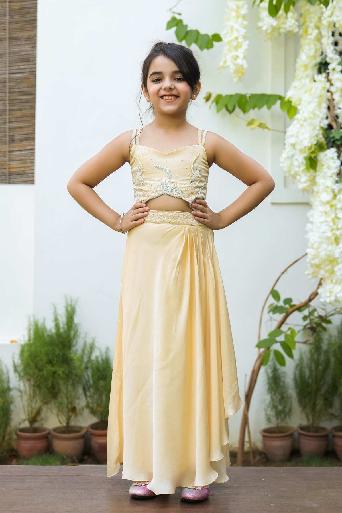 Buy Kids Designer Littleens Draped dress with delicate butterfly winged neckline and cuff outs, embroidered bodice, and modified portrait hemline contrasted with soft drapes that are gathered and clenched at the waist to accentuate the form Online at ScrollnShops